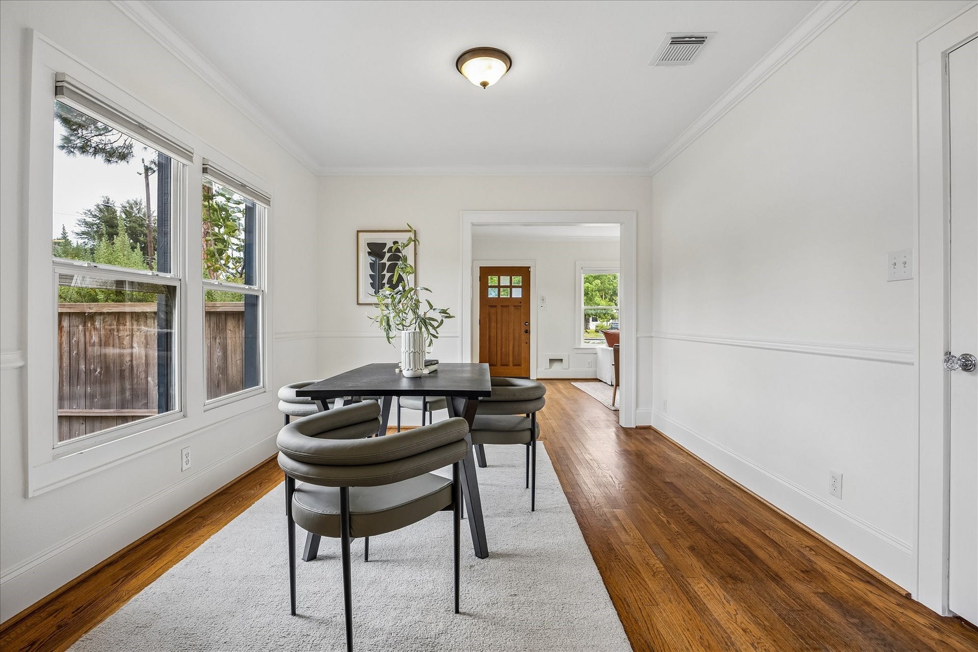 636 Pizer Street, Houston, TX 77009 Living opens to a light-filled formal dining room