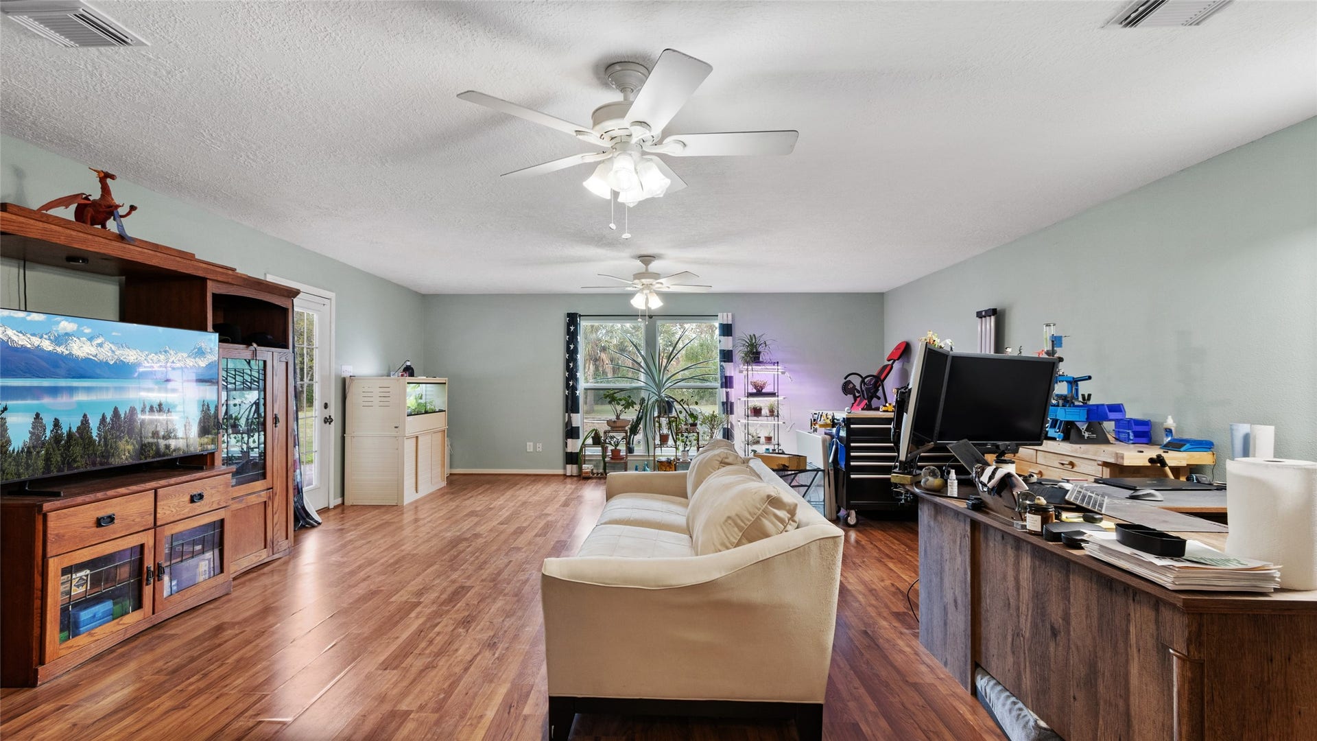 111 County Road 932, Alvin, TX 77511 Plenty of room to move comfortably in this large second primary bedroom, with wheelchair accessibility and a separate backyard door.