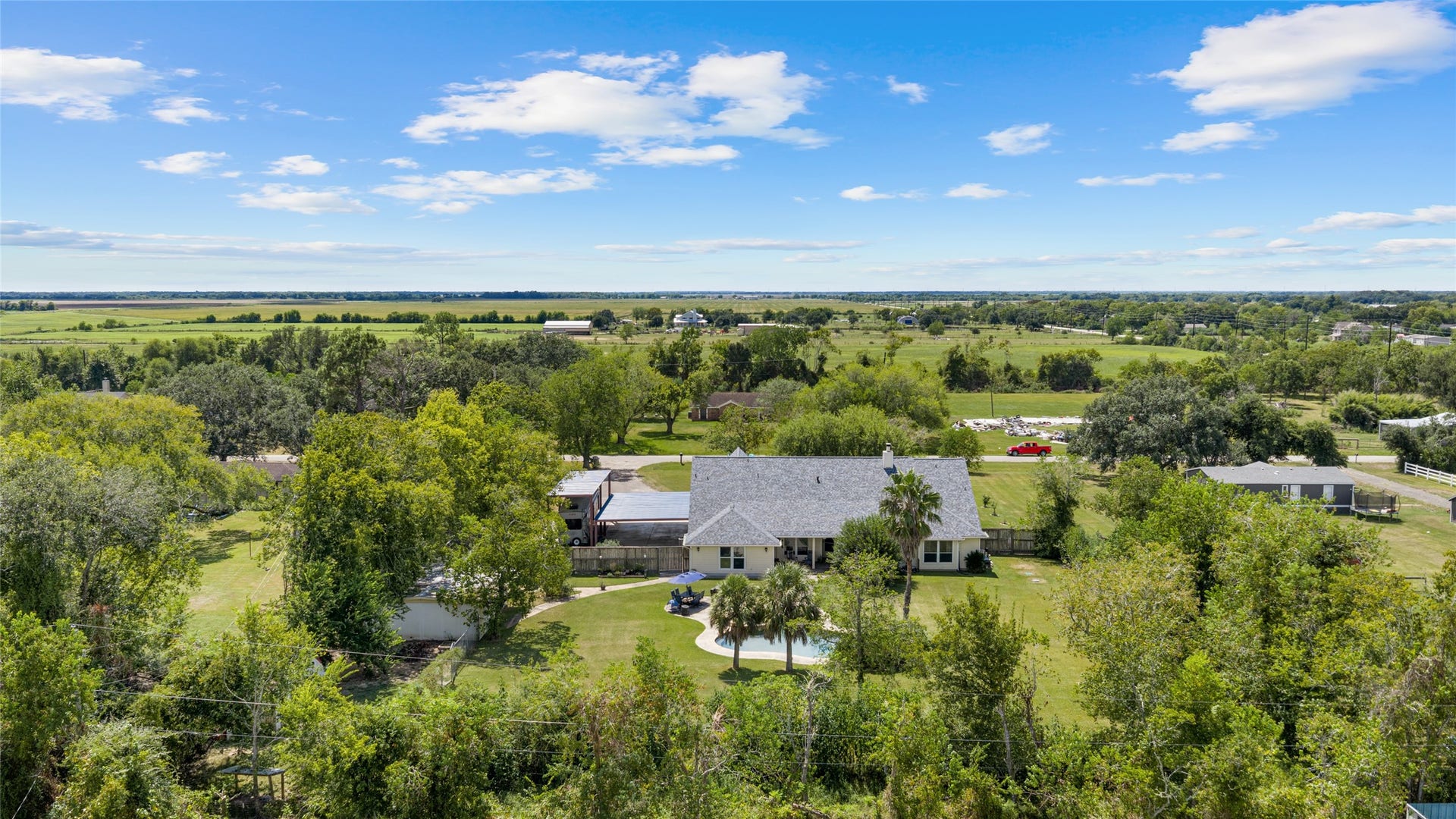 111 County Road 932, Alvin, TX 77511 A look from above at the backyard and the full footprint of this spacious property.