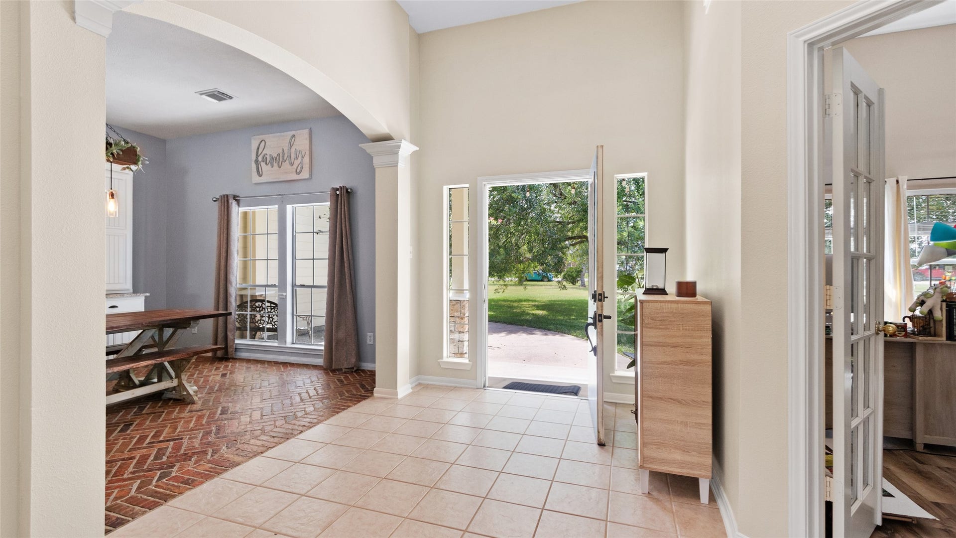 111 County Road 932, Alvin, TX 77511 As you turn back toward the front door, youll see the dining room to the left and a flexible bedroom or office space to the right.