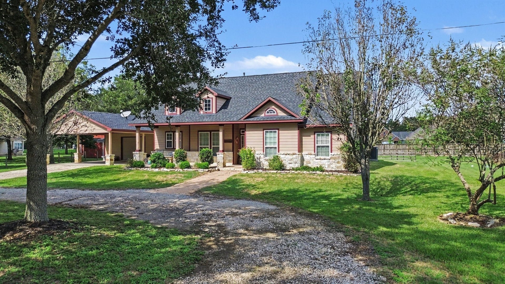 3014 Bowser Road, Fulshear, TX 77441 Beautiful country setting with lovely front porch, garage & carport, small barn and a full acre of land to enjoy!