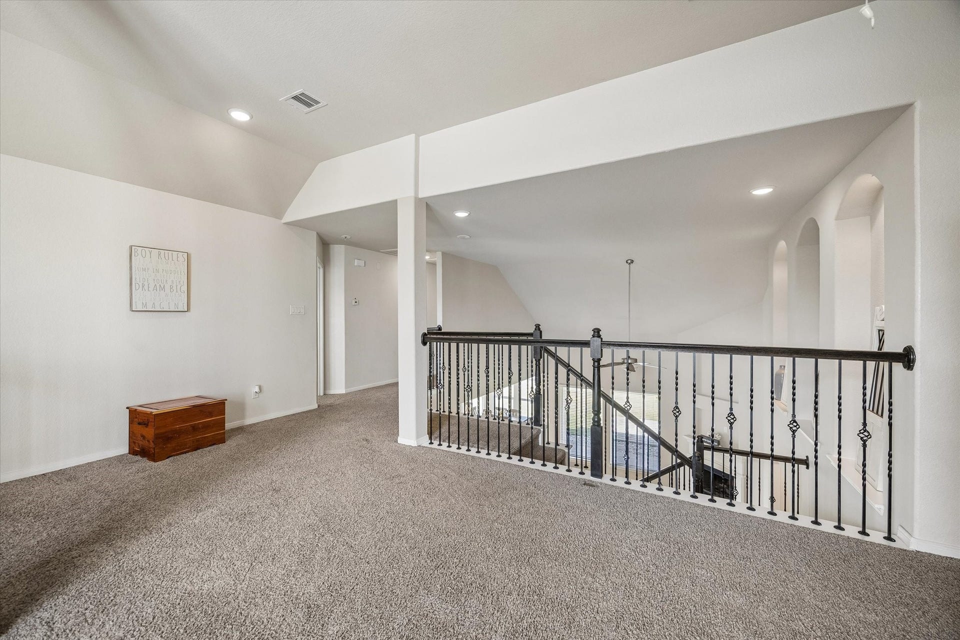 10018 Mahaffey Road, Tomball, TX 77375 Staircase opens up to the large game room upstairs.