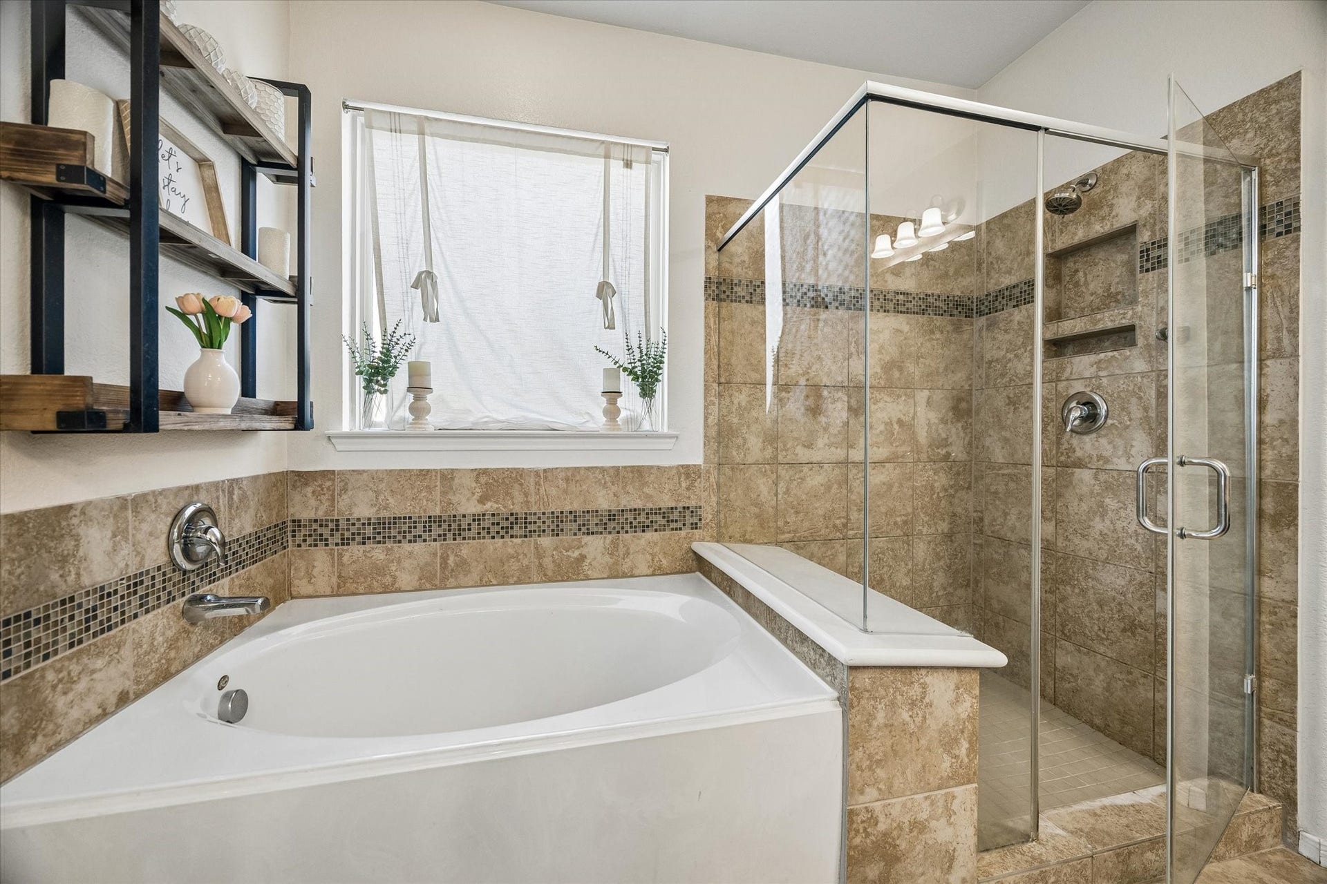 10018 Mahaffey Road, Tomball, TX 77375 Separate shower and tub with beautiful tile.