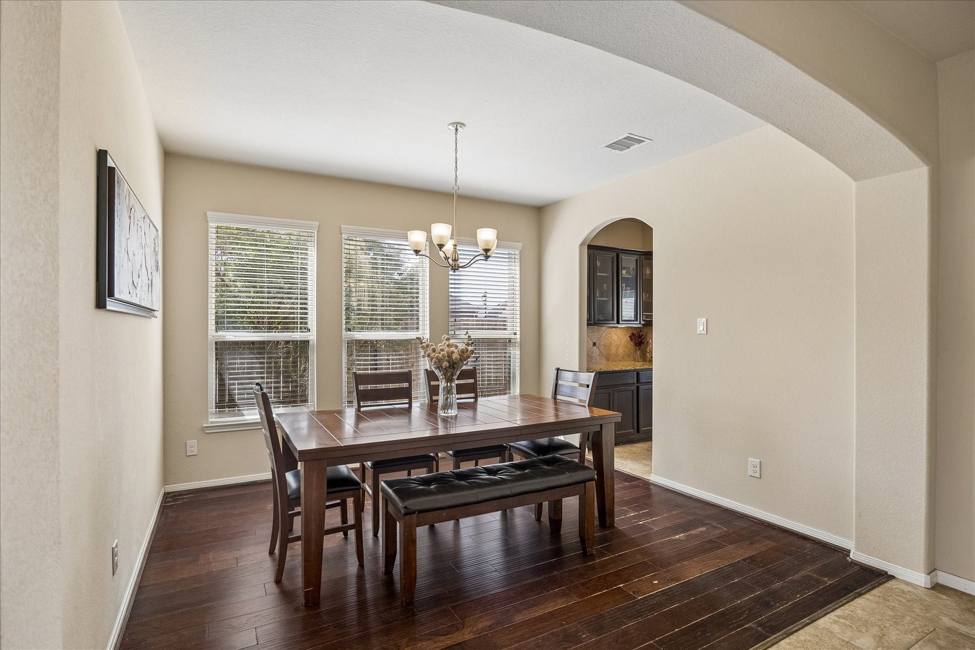 10018 Mahaffey Road, Tomball, TX 77375 Formal dining room with a beautiful, arched ceiling and three large windows to let in the sunlight.