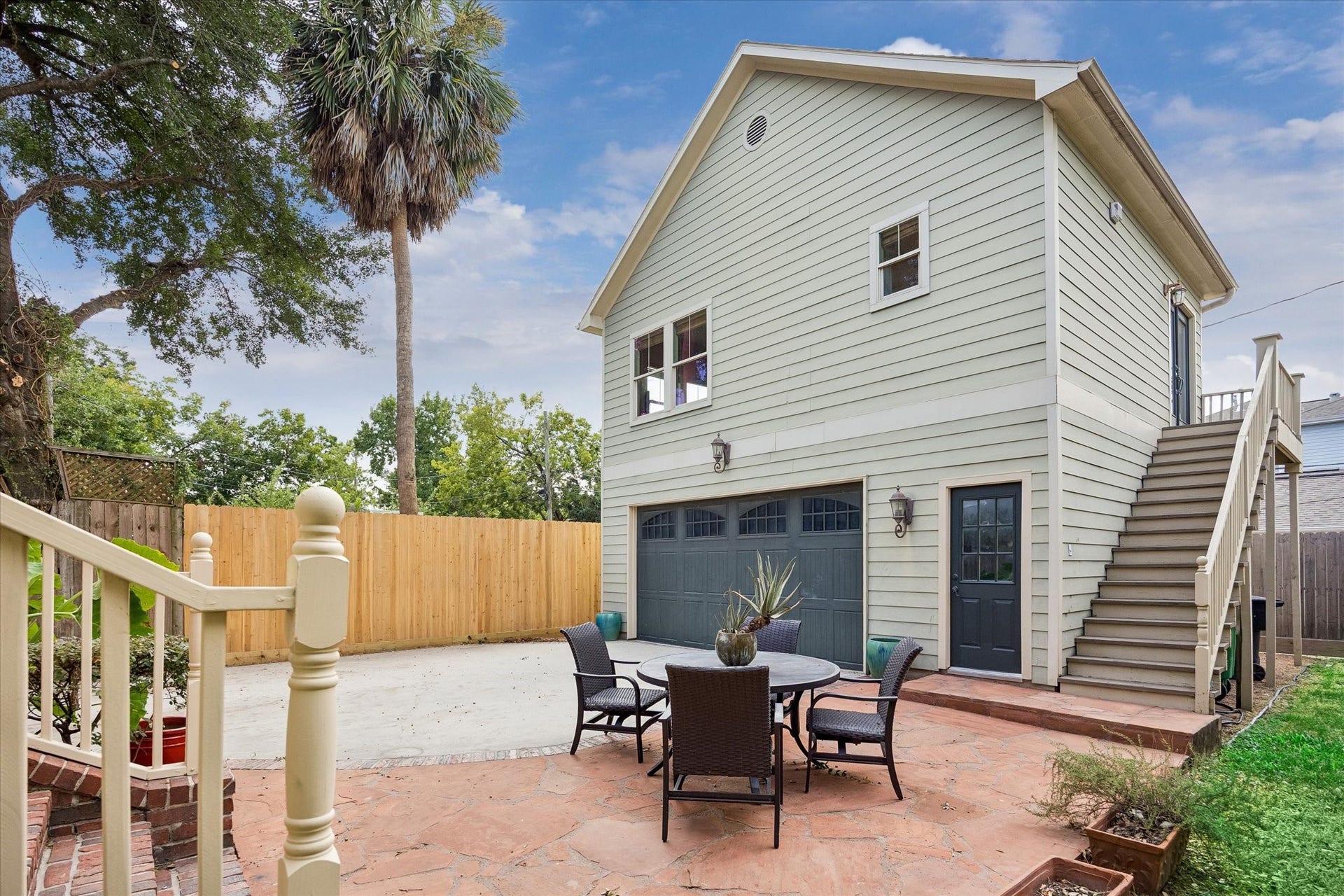 The backyard is set up for easy outdoor living, with room to dine, relax and enjoy a little breathing room in the city.
