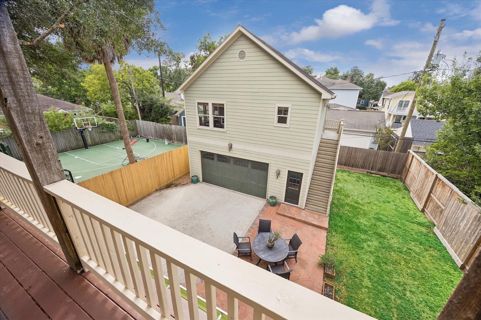 This is the kind of view that makes you want to linger a little longer. From the primary balcony, you can look out over the backyard and guest apartment over the garage while enjoying a peaceful perch that feels tucked away from the rest of the home.