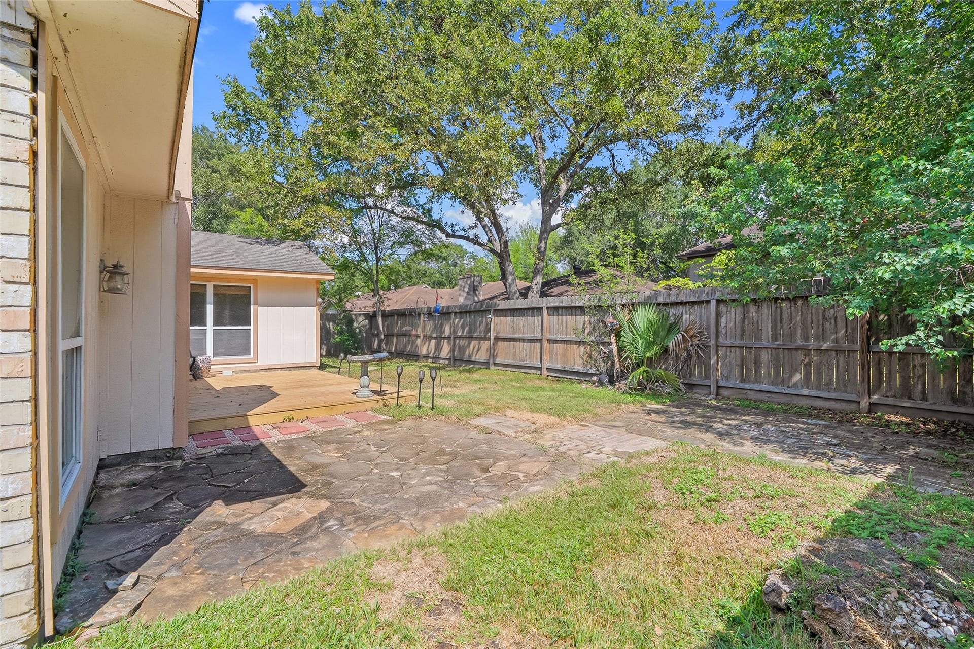 25806 Old Carriage Lane, Spring, TX 77373 The lot is surrounded by mature trees.