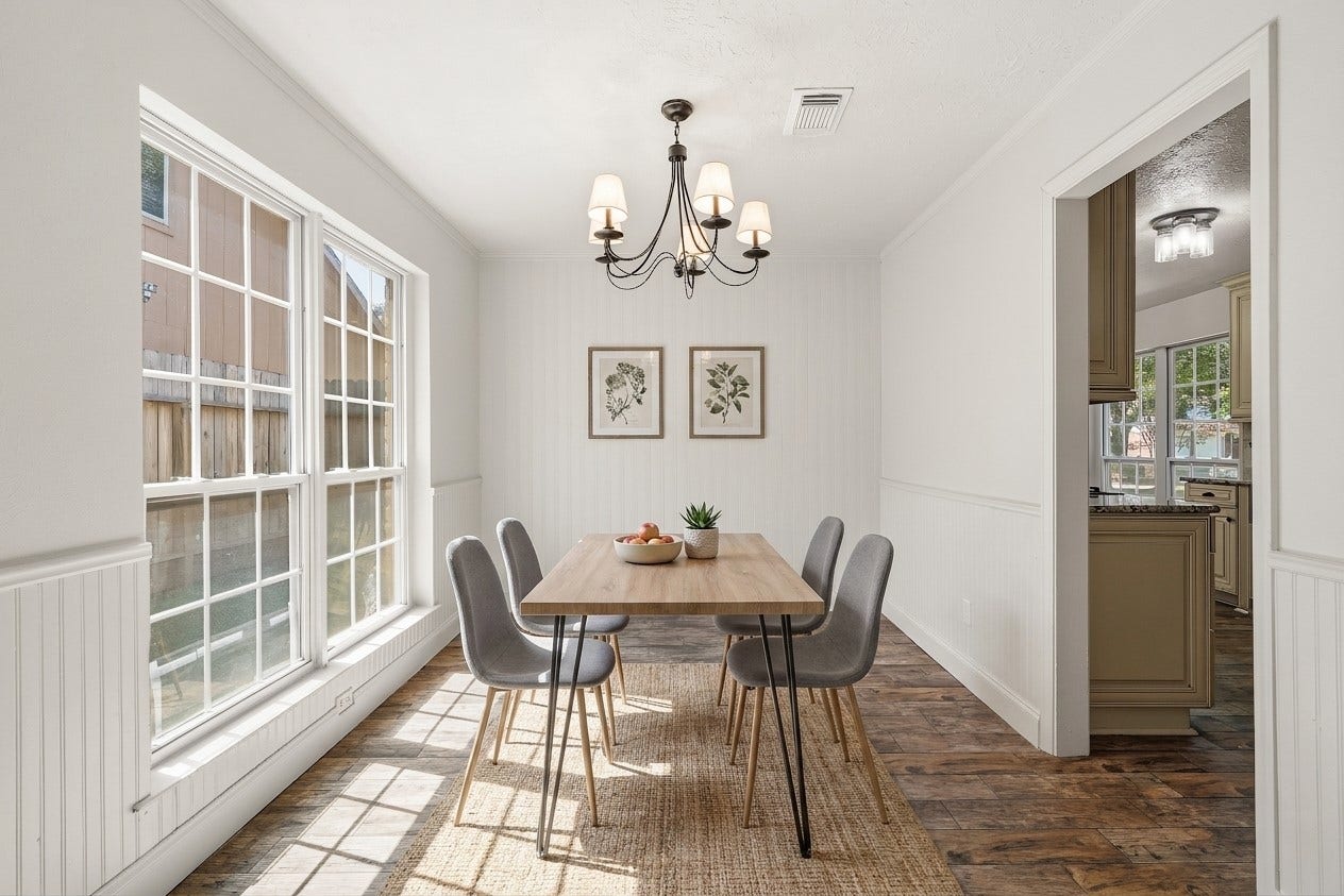 25806 Old Carriage Lane, Spring, TX 77373 Bright and inviting dining area with abundant natural light. This image is AI enhanced.