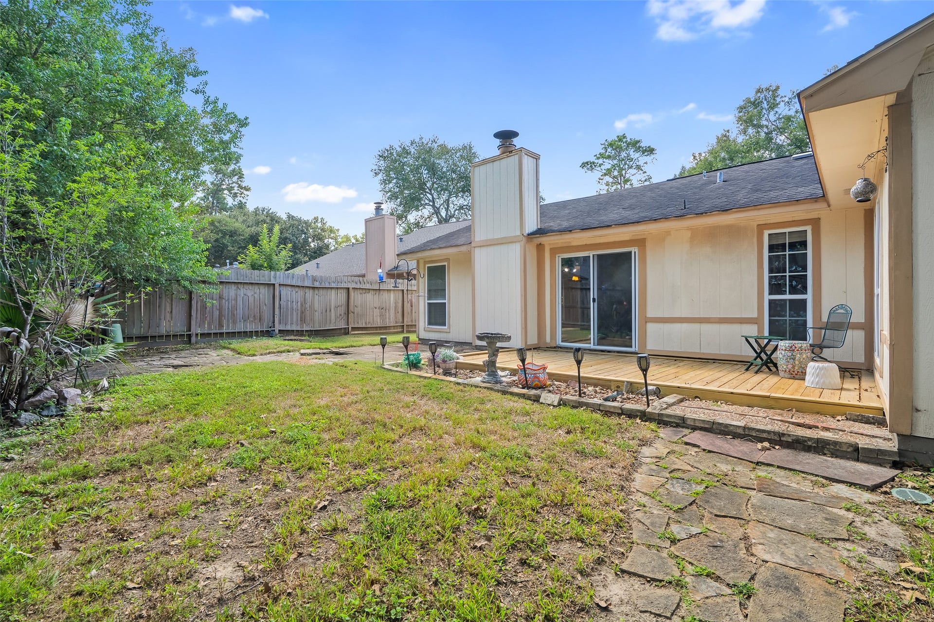 25806 Old Carriage Lane, Spring, TX 77373 Spacious, fenced backyard provides plenty of space to relax or entertain.