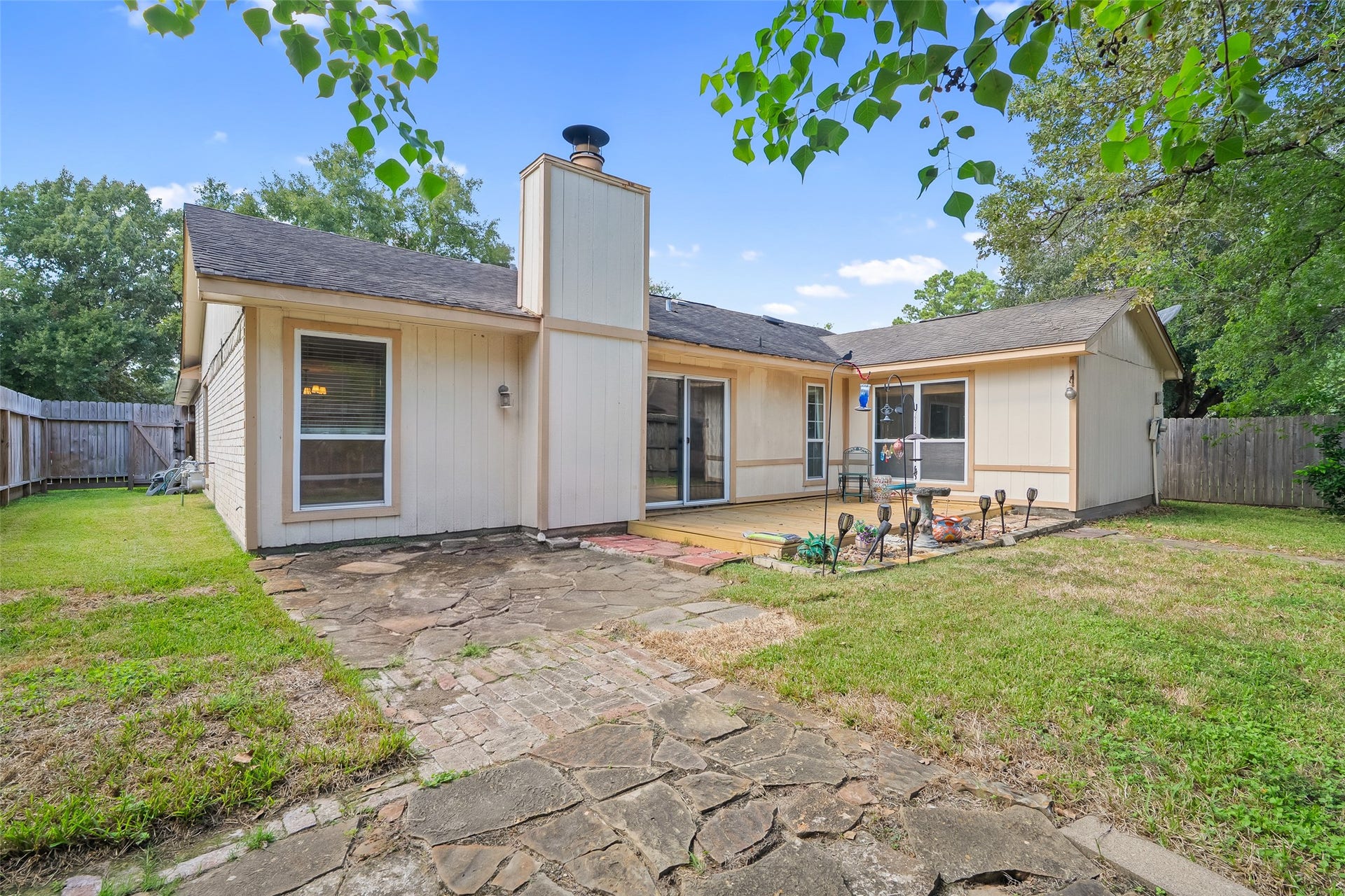 25806 Old Carriage Lane, Spring, TX 77373 Sliding glass doors lead out onto the back patio.