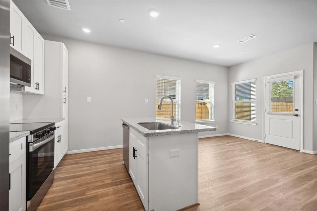 802 N Thompson Street, Conroe, TX 77301 Image showcases finishes and conditions. Floor plan may vary.
