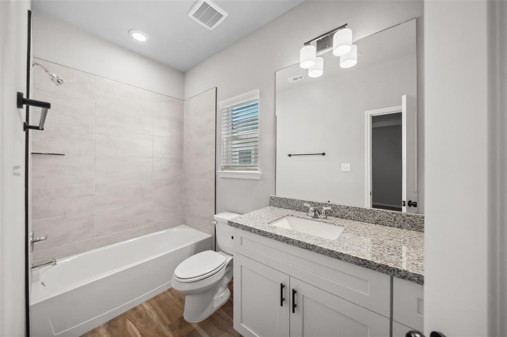 802 N Thompson Street, Conroe, TX 77301 Image showcases finishes and conditions. Floor plan may vary.