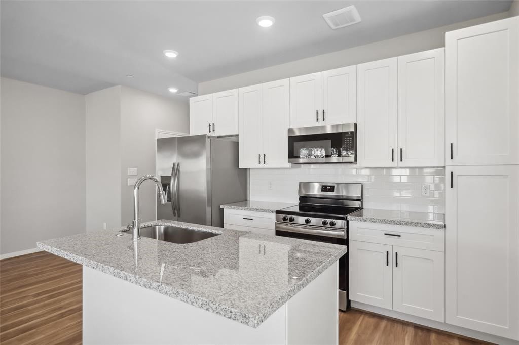 802 N Thompson Street, Conroe, TX 77301 Image showcases finishes and conditions. Floor plan may vary.