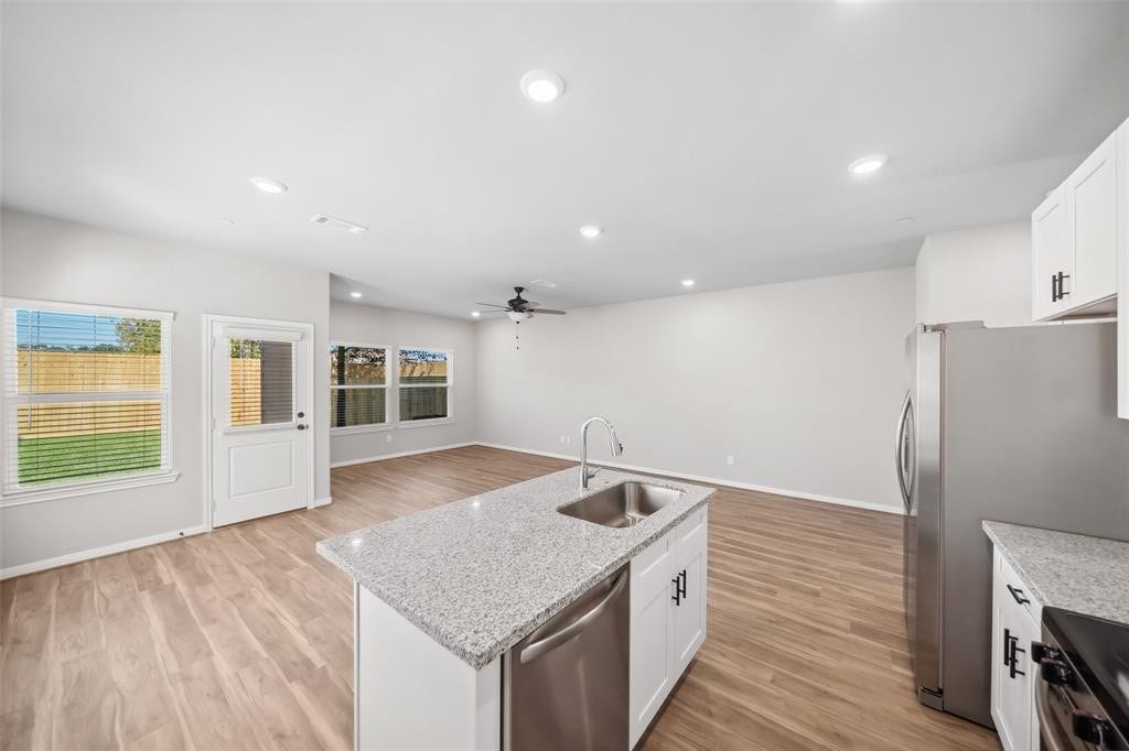 802 N Thompson Street, Conroe, TX 77301 Image showcases finishes and conditions. Floor plan may vary.