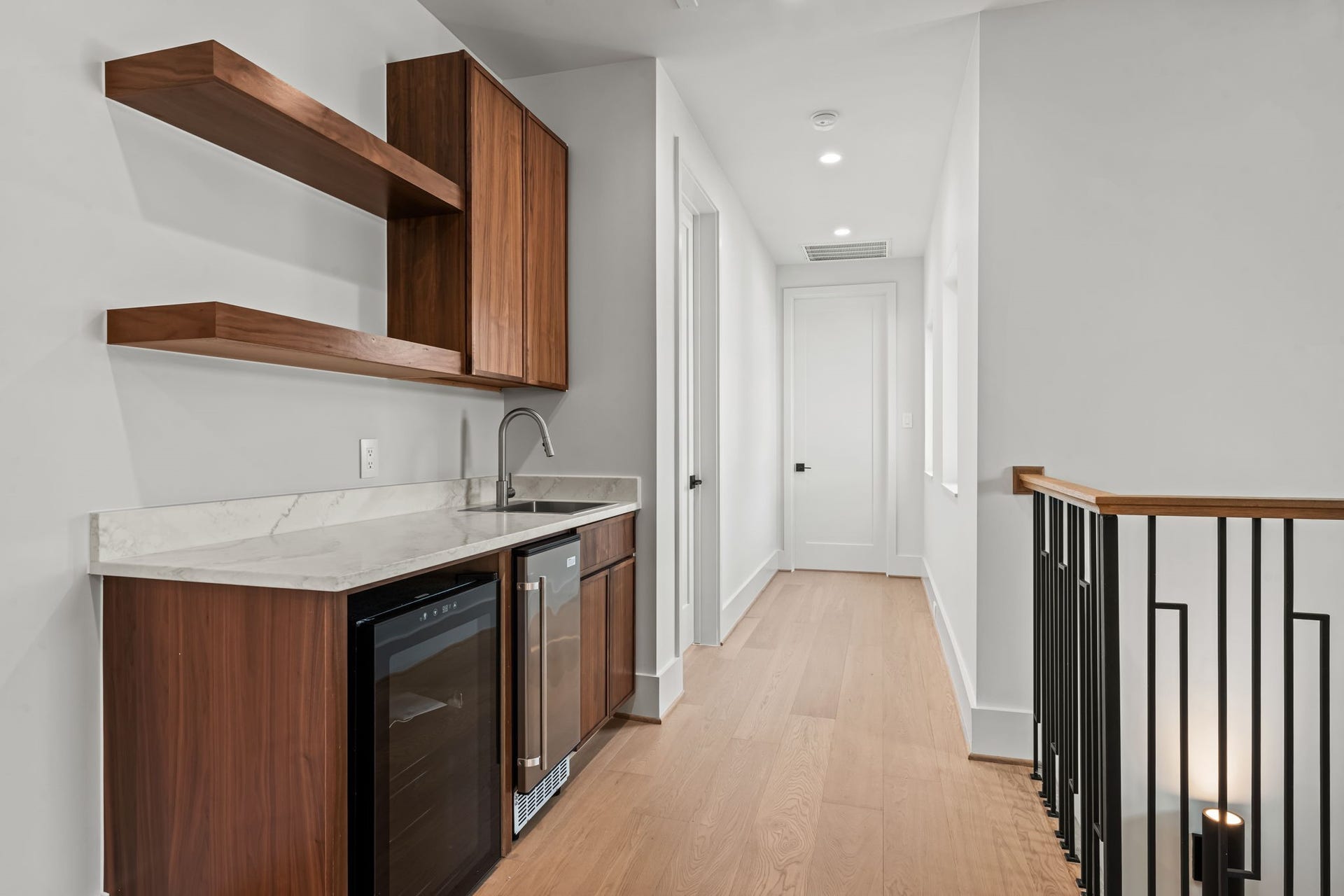 5409 Chevy Chase, #A, Houston, TX 77056 The third-floor wet bar sits between the staircase and game room.