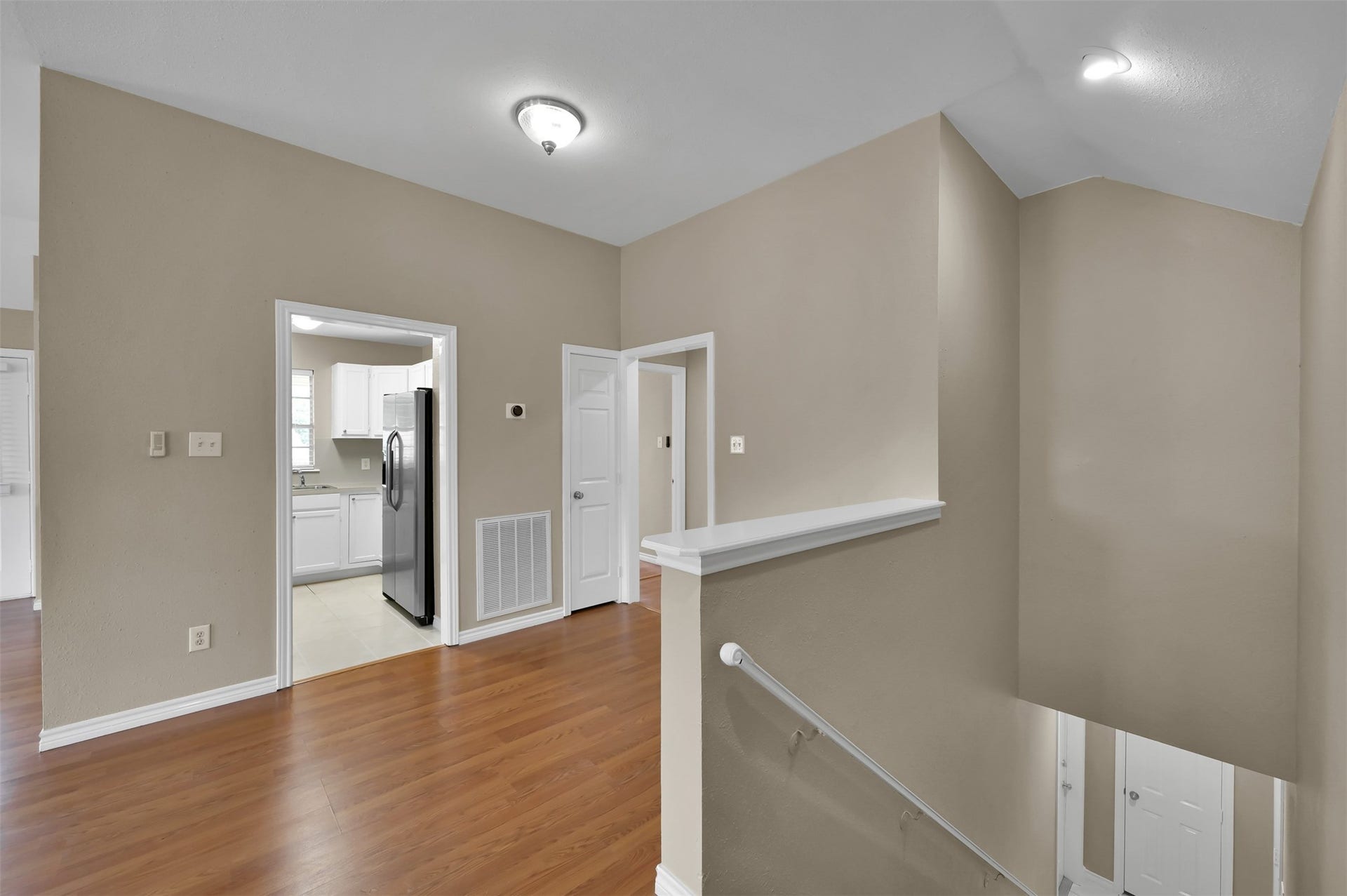 1141 Lovett Street, Tomball, TX 77375 Upstairs kitchen featuring modern stainless steel appliances.