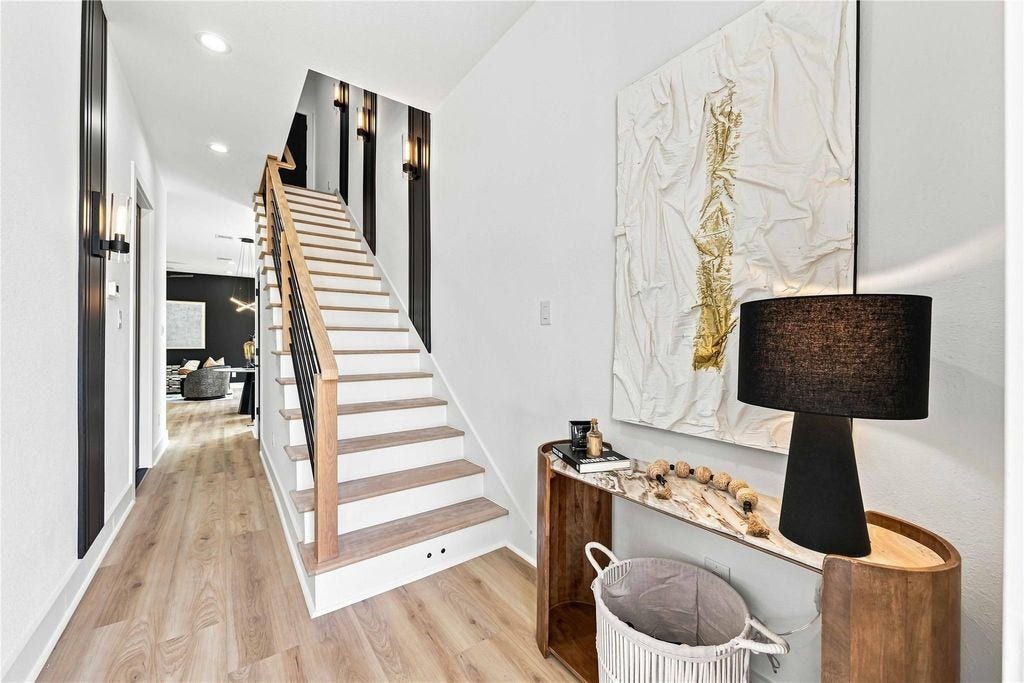 Entry & Illuminated Staircase