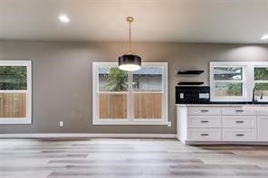 Dedicated dining space just off the kitchen, perfect for weeknight dinners, hosting friends, or a cozy breakfast table with natural light nearby.