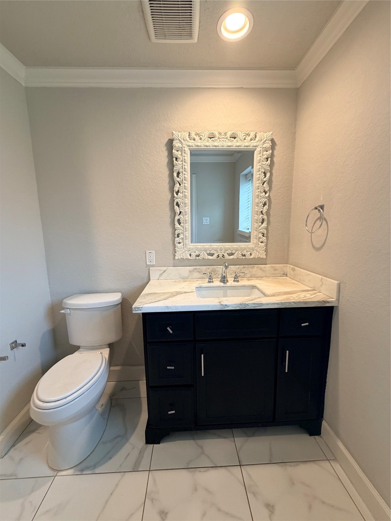 2506 Northern Drive, League City, TX 77573 Bathroom 2 custom marble countertop. Comfort height elongated toilet