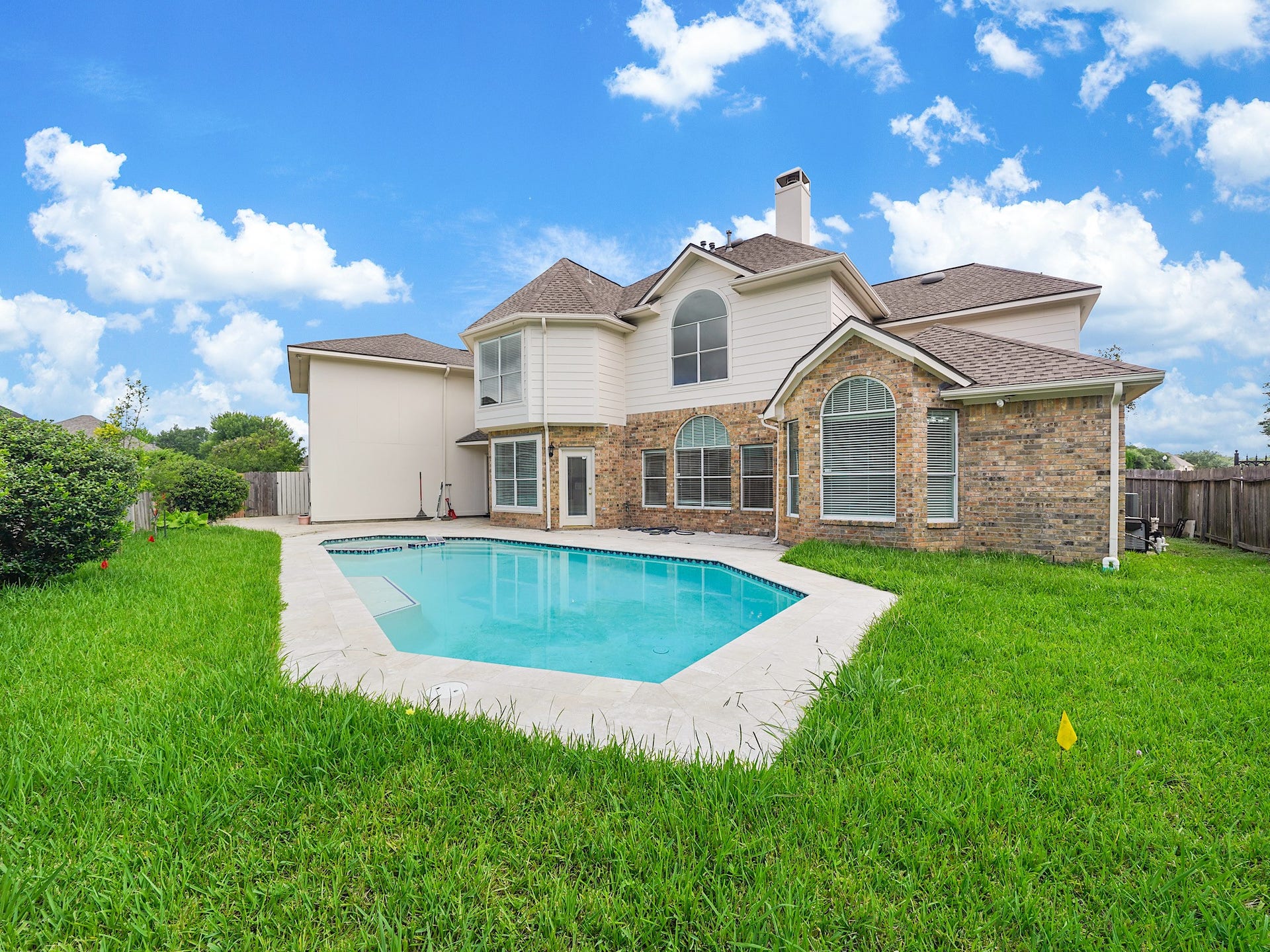 3907 Garnet Falls, Sugar Land, TX 77479 Large backyard featuring a private swimming pool.