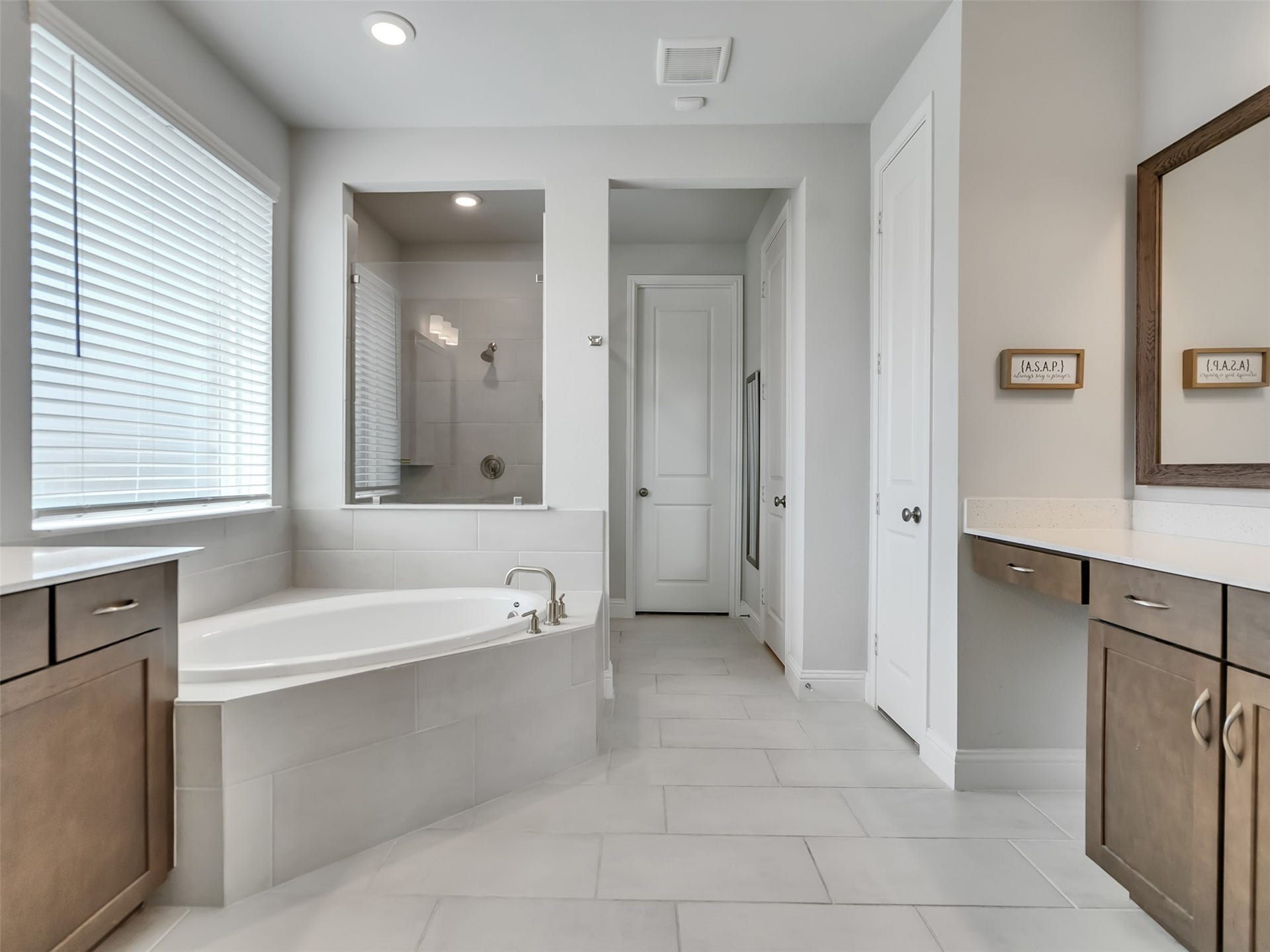 17204 Begonia Bend Drive, Conroe, TX 77302 Primary bathroom has soaking tub and separate shower with closet in the rear