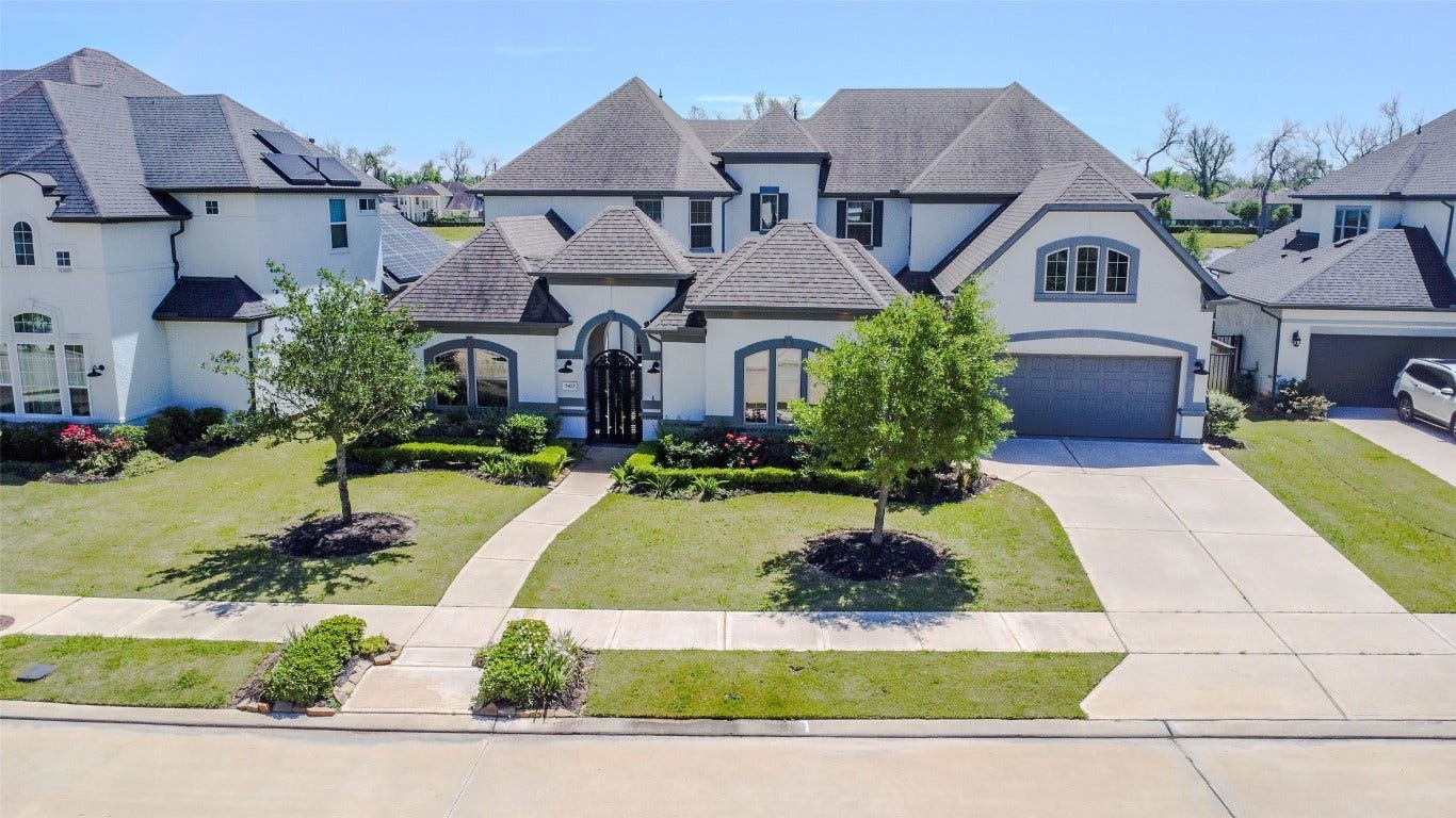 5423 Priamus Drive, Missouri City, TX 77459 Elegant two-story home with a spacious driveway, well-maintained lawn, and charming curb appeal. Features a three-car garage and a stylish exterior with large windows and neatly landscaped gardens. Ideal for a family seeking a sophisticated and welcoming residence.