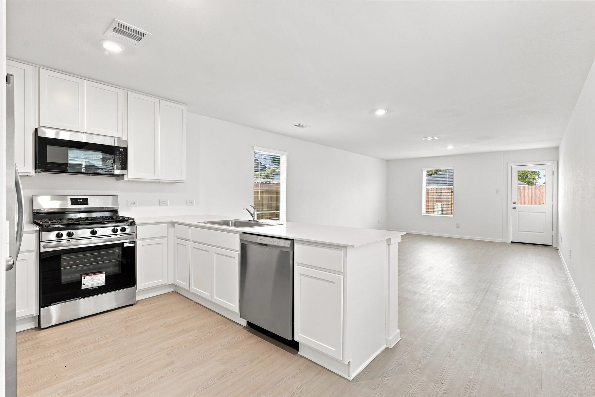20151 Green Mallard St, Crosby, TX 77532 Living Area/Dining/Kitchen