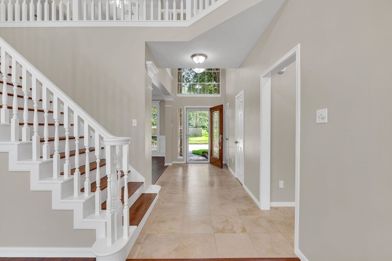 4131 Raven River Drive, Pasadena, TX 77059 Welcoming entry sets the tone for the home with fresh paint, crown molding and an inviting flow into the main living areas.