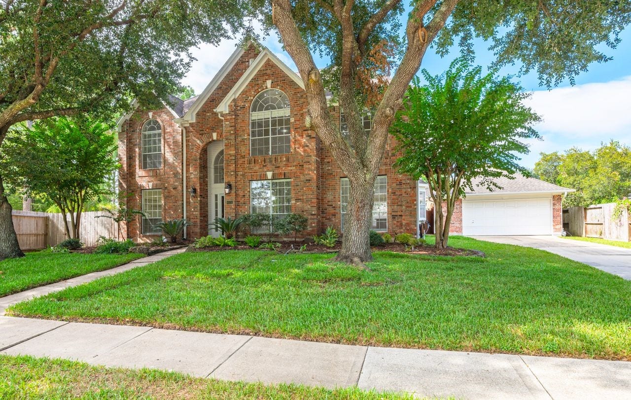 4131 Raven River Drive, Pasadena, TX 77059 A rare find! This home features an impressive 4-car tandem garageideal for the car enthusiast or anyone needing exceptional garage and storage space.