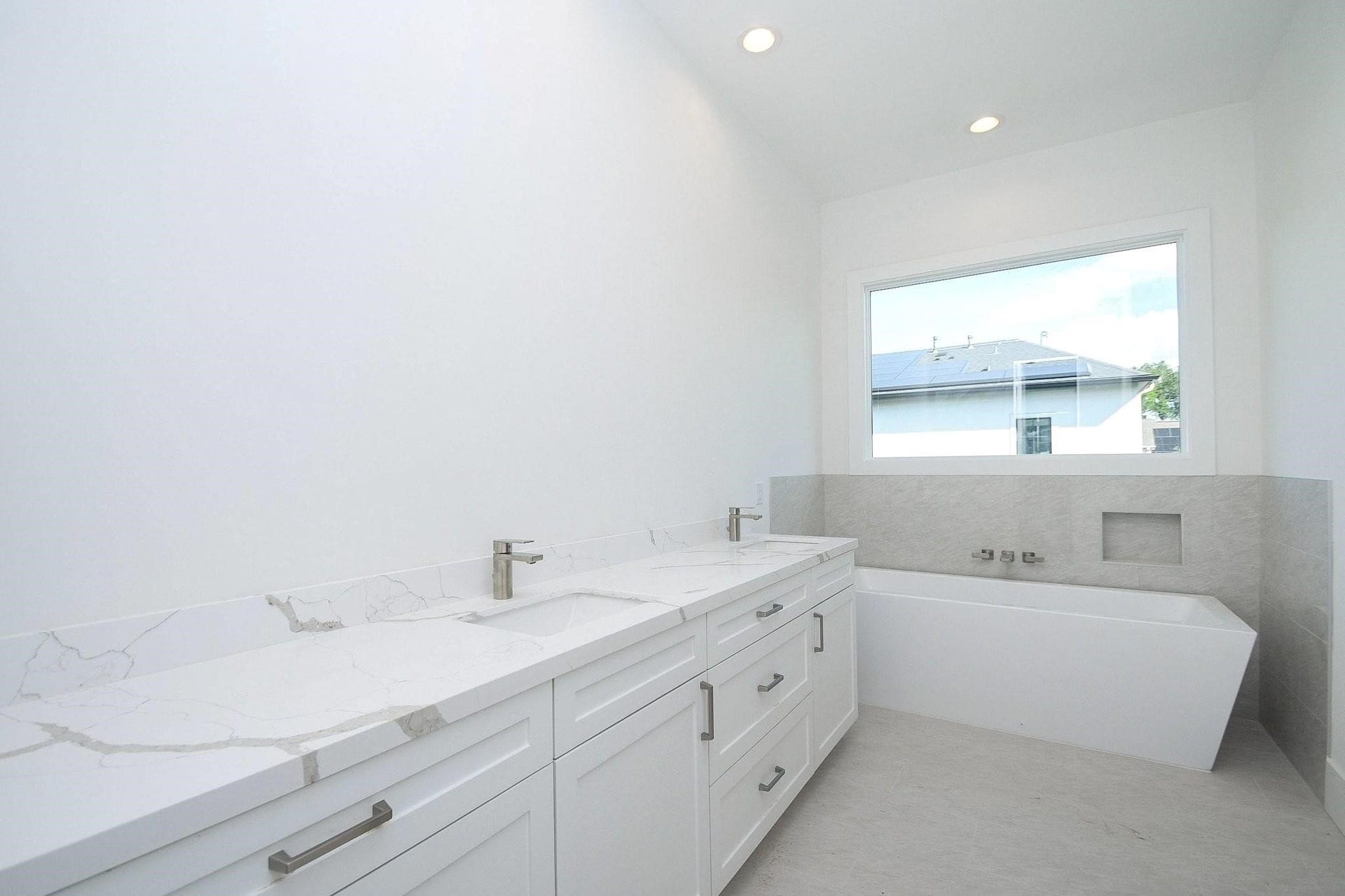 Primary bathroom with stand alone tub, dual sinks, and upgrades coming soon.
