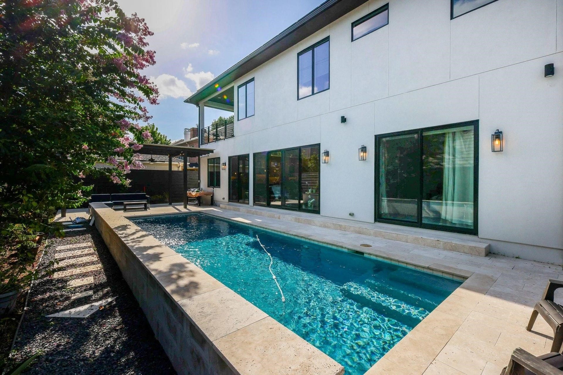 EXAMPLE of pool at model home. Optional upgrade for additional cost. 4002 Marquette will come with a covered patio