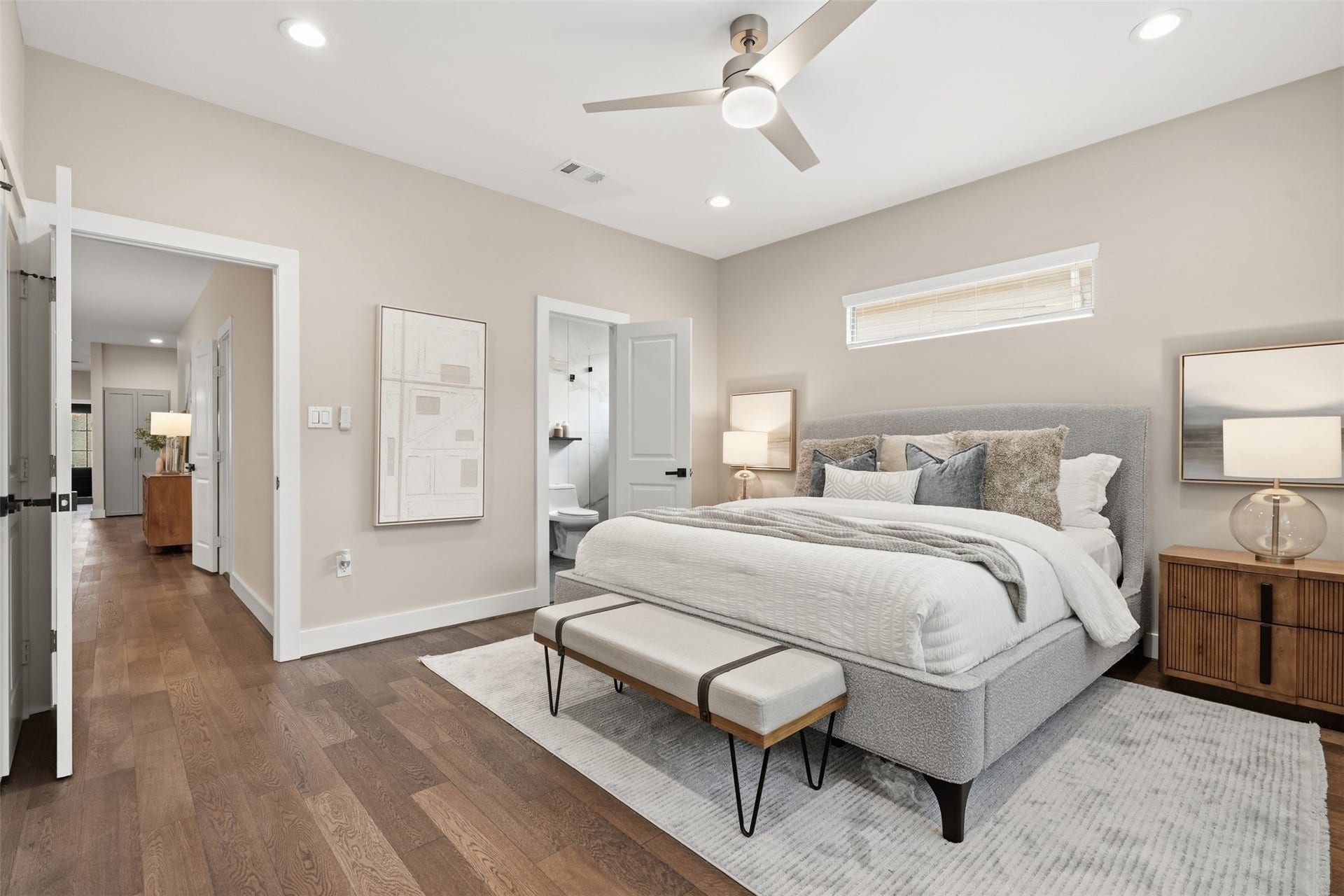 2109 Sul Ross Street, Houston, TX 77098 Relaxing primary suite with hardwood floors and a private en-suite bathroom