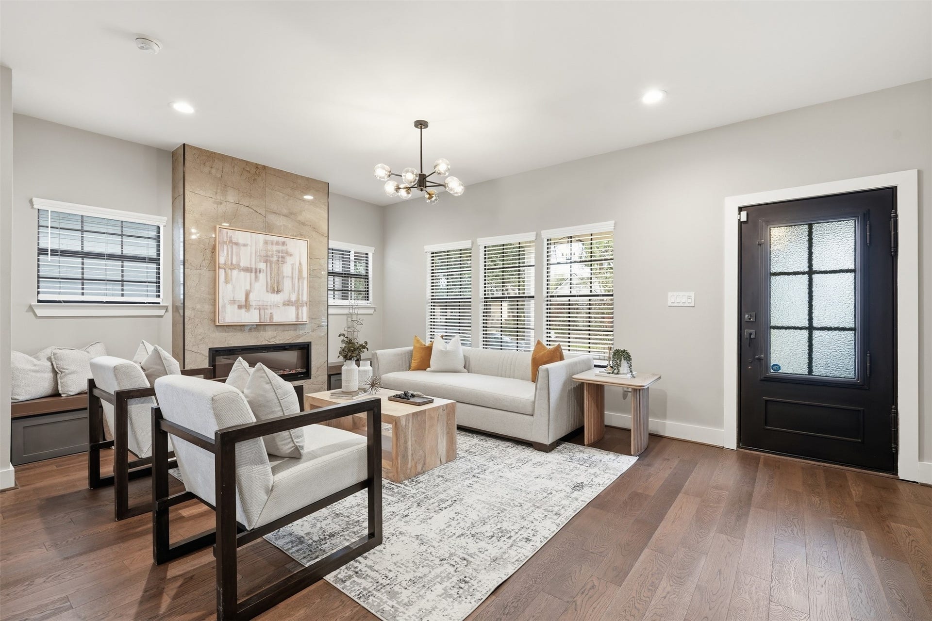 2109 Sul Ross Street, Houston, TX 77098 Spacious living room featuring elegant finishes and beautiful hardwood floors