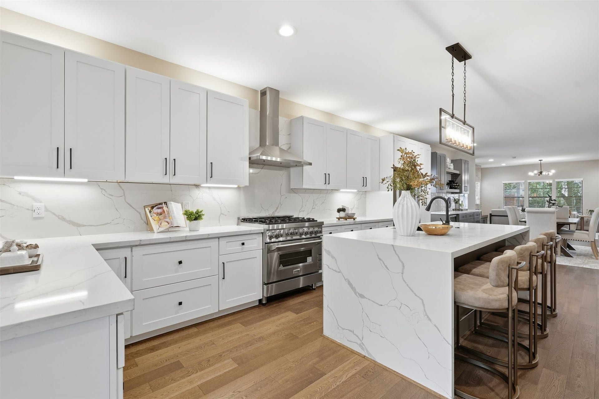 2109 Sul Ross Street, Houston, TX 77098 Sleek cabinetry, stainless-steel appliances, and designer finishes complete this kitchen