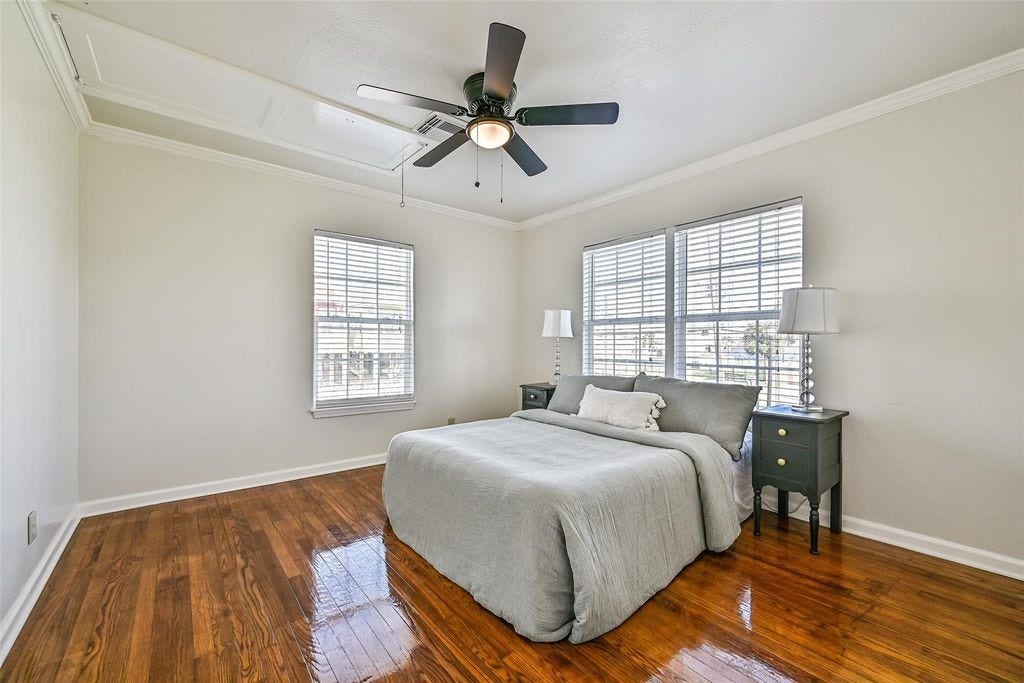 1029 62nd Street, #Up, Galveston, TX 77551 Second bedroom with two windows allowing plenty of light to come in. Both bedrooms featuring new ceiling fans and lgiht fixtures.