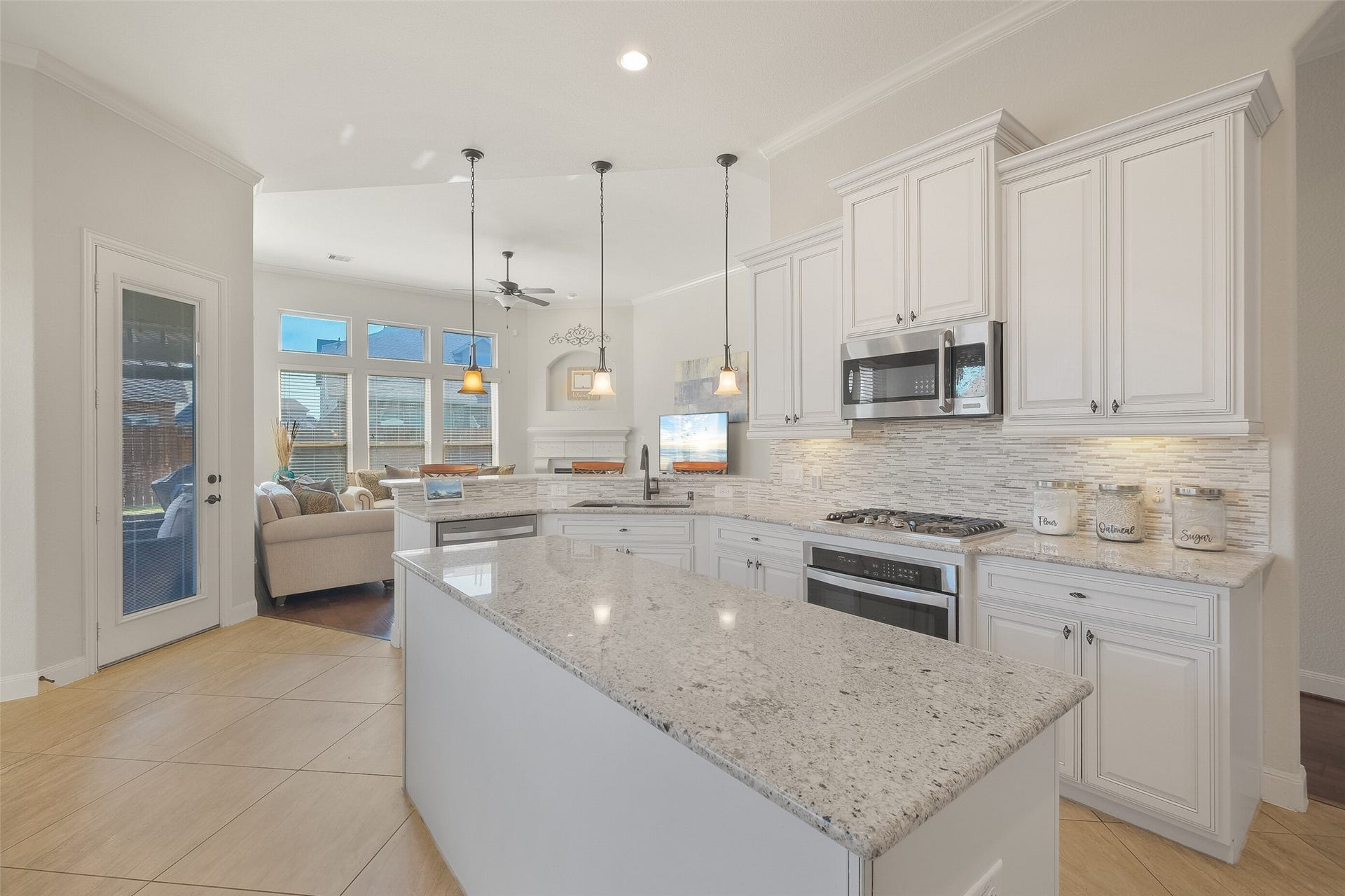 8111 Foster Gate Court, Richmond, TX 77407 Kitchen to Family Room View
