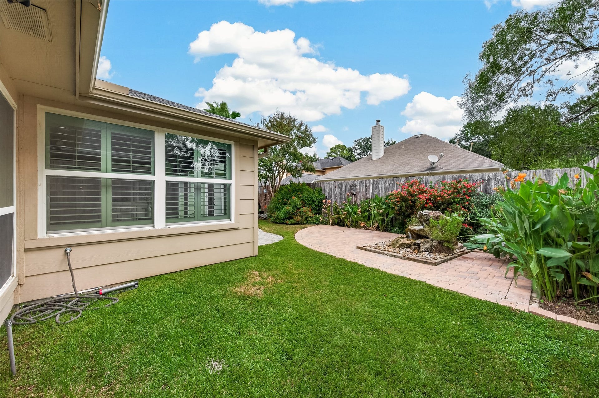 1518 Watts Avenue, Katy, TX 77493 The yard on the left is the perfect size for pets or children.
