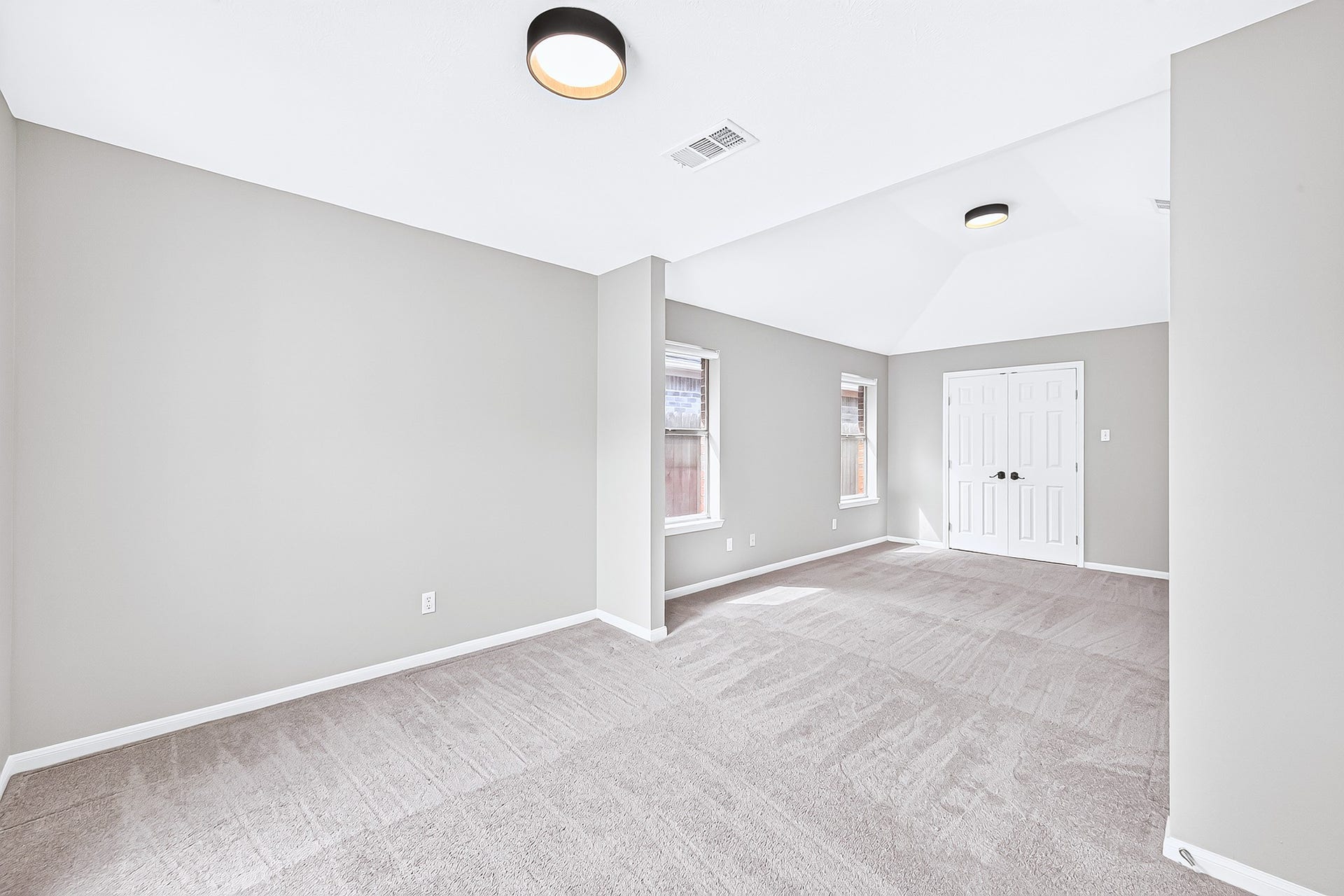 1518 Watts Avenue, Katy, TX 77493 The primary bedroom is located on the right side of the home and features a sitting area, fresh paint and updated lighting.