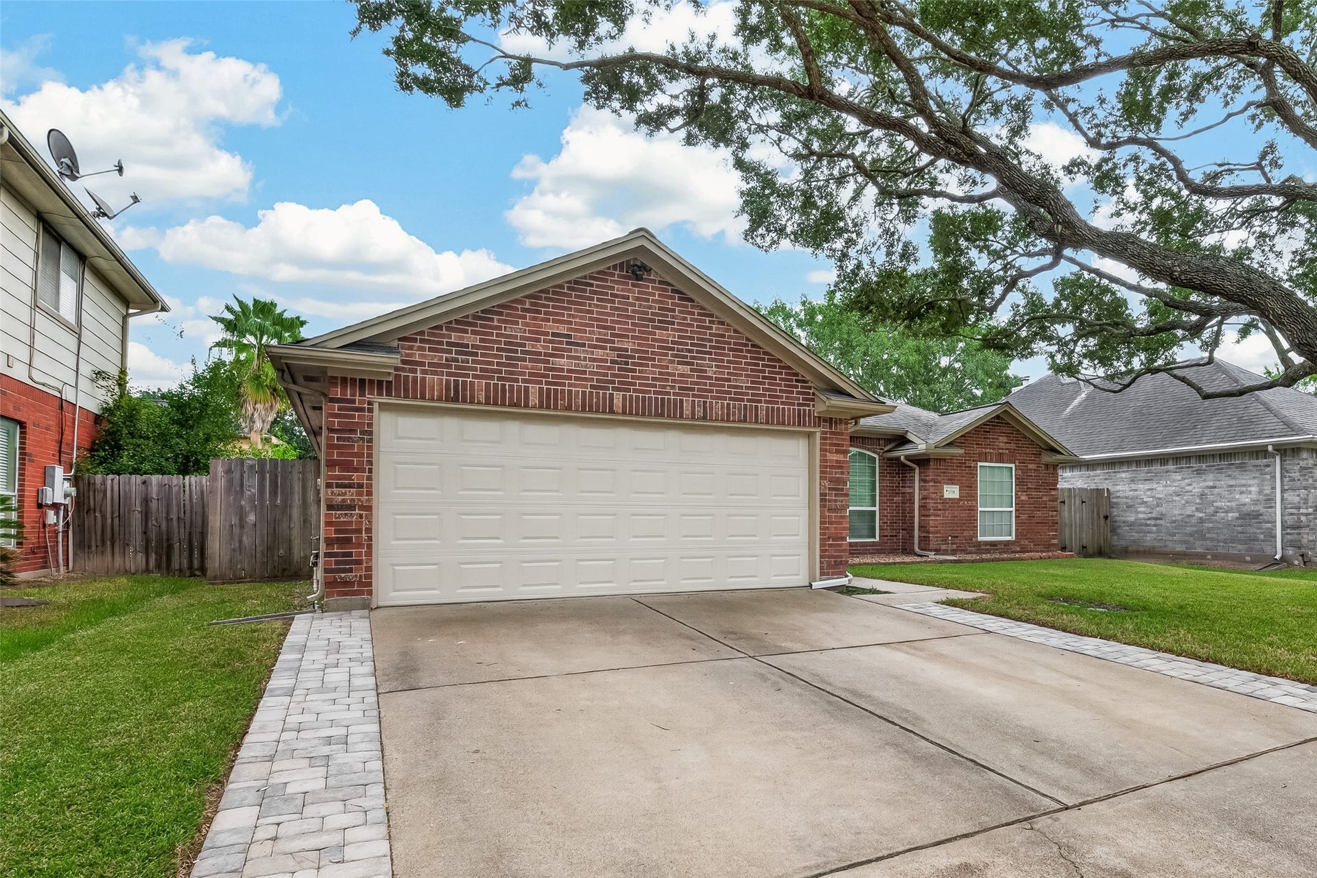 1518 Watts Avenue, Katy, TX 77493 You will appreciate the extended driveway so you won't have to step in grass when you get in and out of your vehicle.