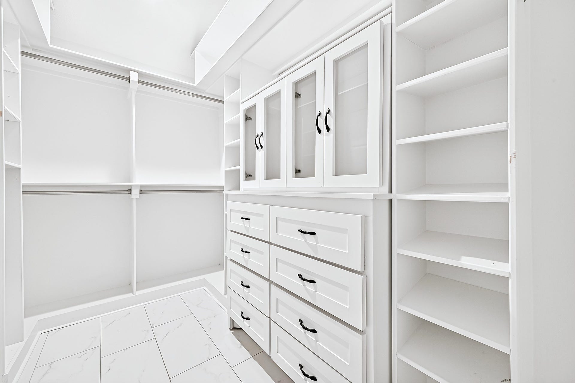 1518 Watts Avenue, Katy, TX 77493 Custom built-in cabinets will keep your wardrobe organized.