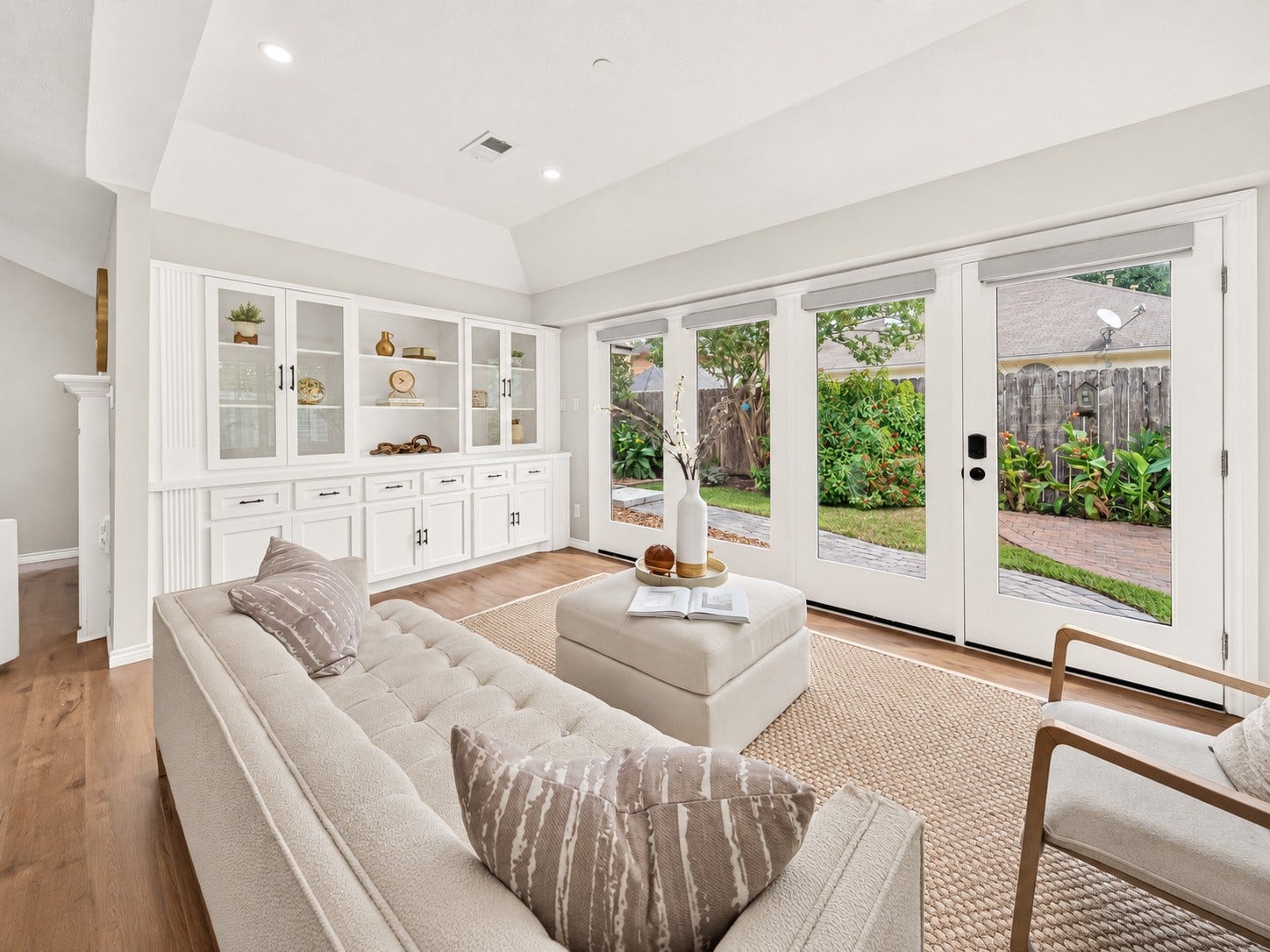 1518 Watts Avenue, Katy, TX 77493 The wall of windows brings in beautiful natural light and the double paned windows keep the space from becoming hot.