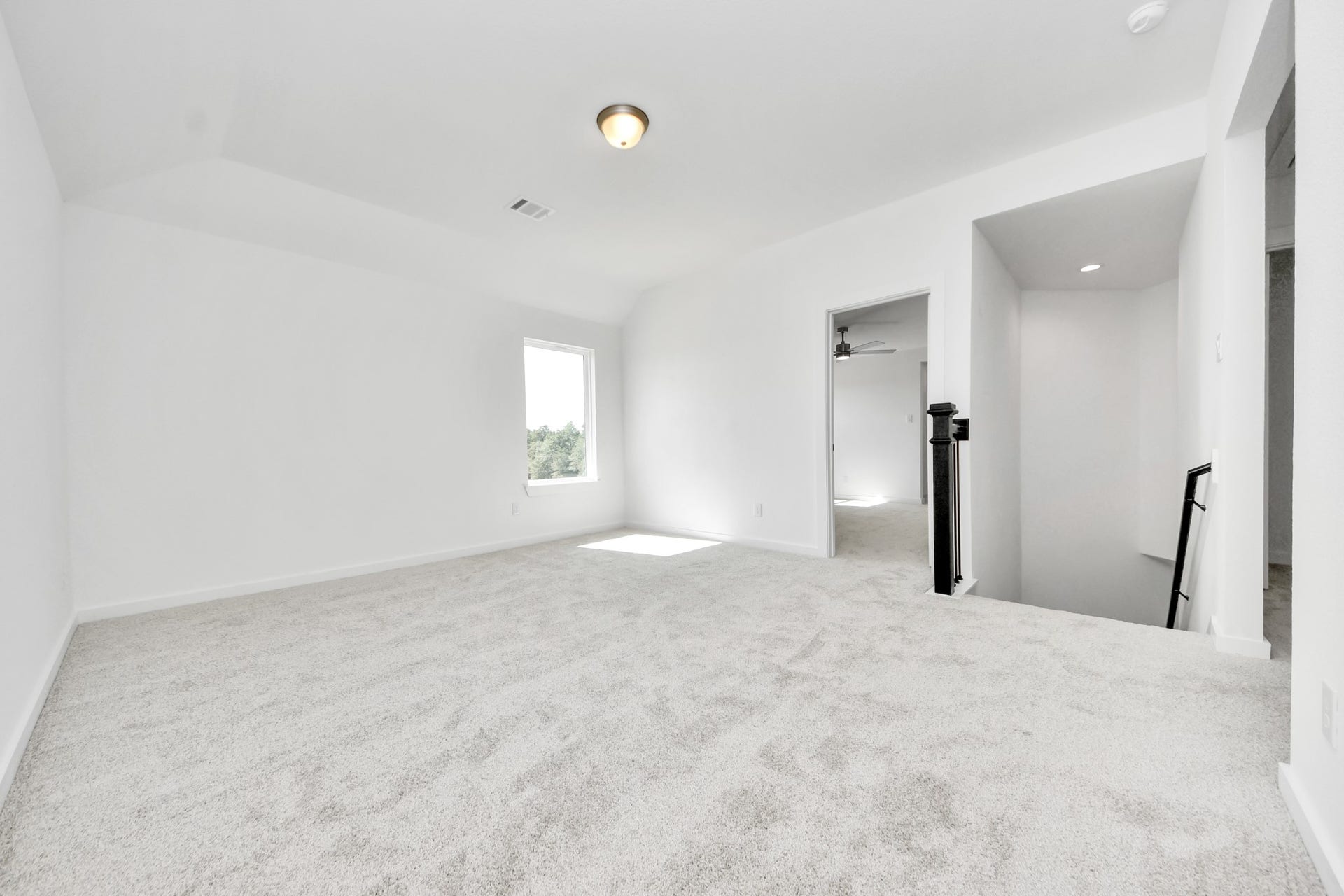 3057 Spoolwood Trail, Magnolia, TX 77355 Come upstairs and enjoy a day of leisure in this fabulous game room! This is the perfect hangout spot or adult game room! Features plush carpet, high ceilings, custom paint and windows for plenty of natural light.