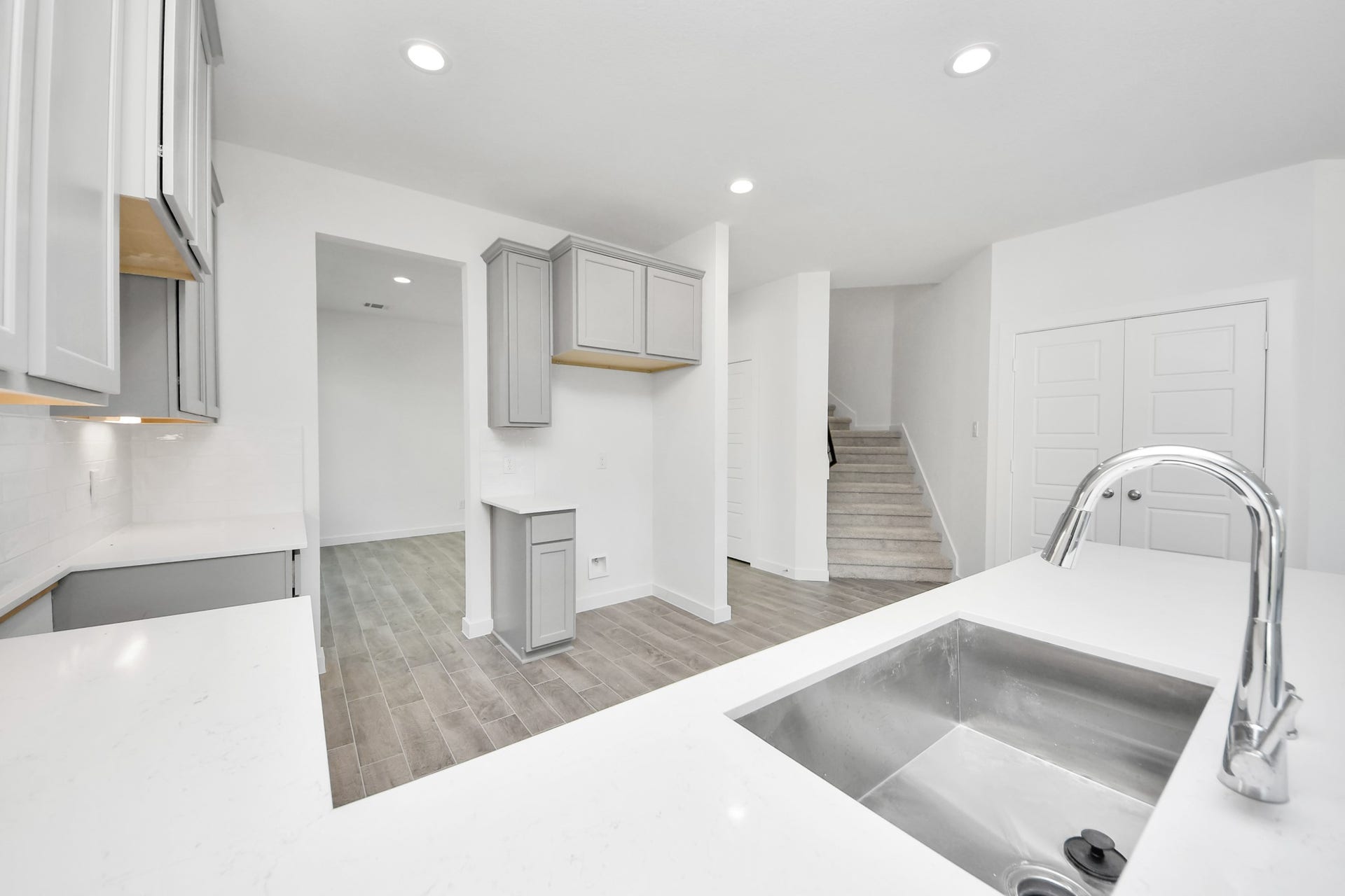 3057 Spoolwood Trail, Magnolia, TX 77355 The extended counter area adds both practicality and style, making meal preparation a breeze. Every detail is thoughtfully designed to enhance the kitchen's functionality and aesthetic appeal.