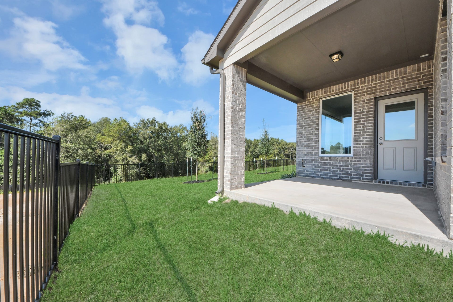 3057 Spoolwood Trail, Magnolia, TX 77355 Come and see this spacious backyard with its beautiful covered patio. There is plenty of room for the kids to play and adults to relax. Perfect for your outdoor living space, patio furniture, bbq pit, and so much more. The possibilities are endless!
