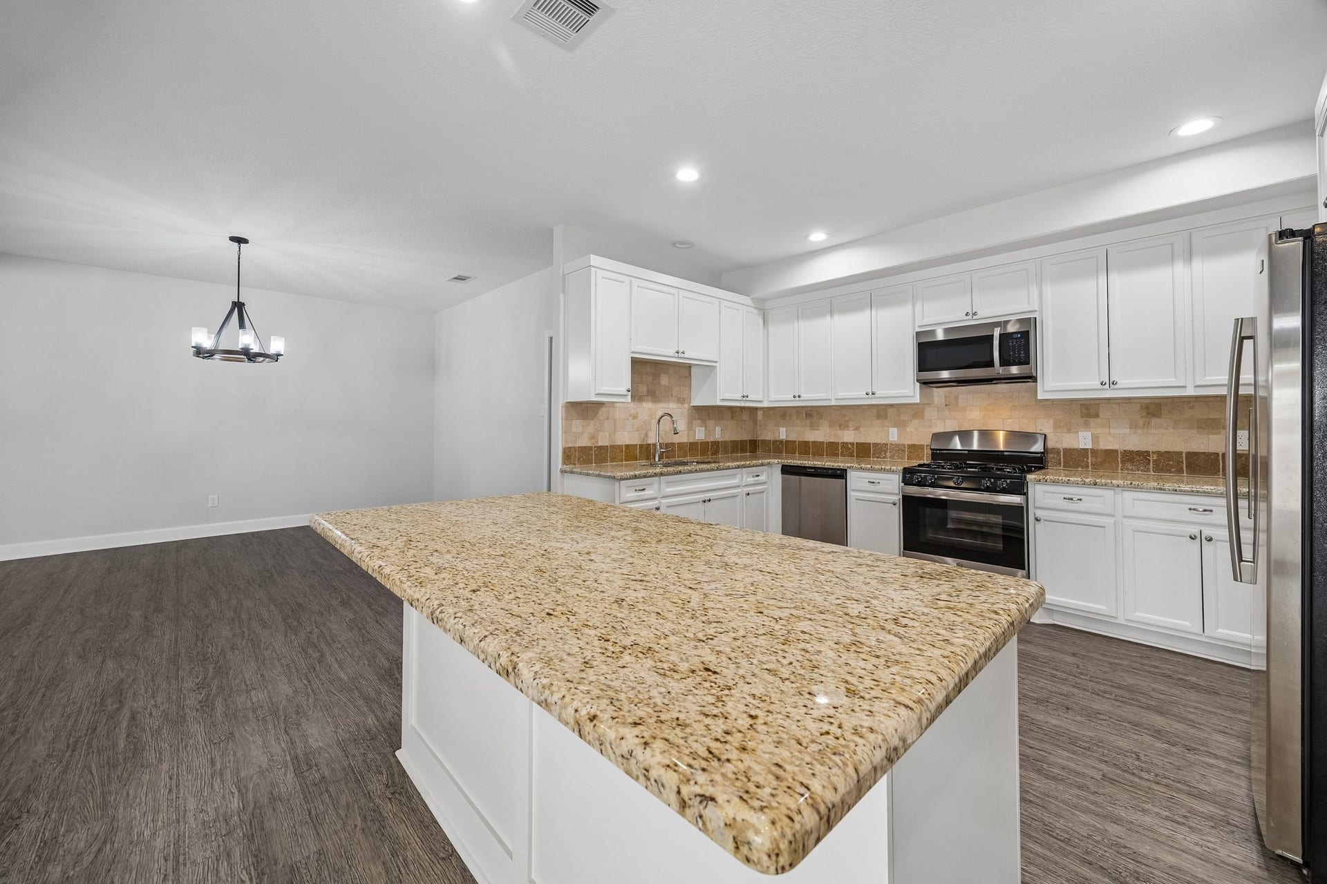 View of the kitchen toward the formal dining area.