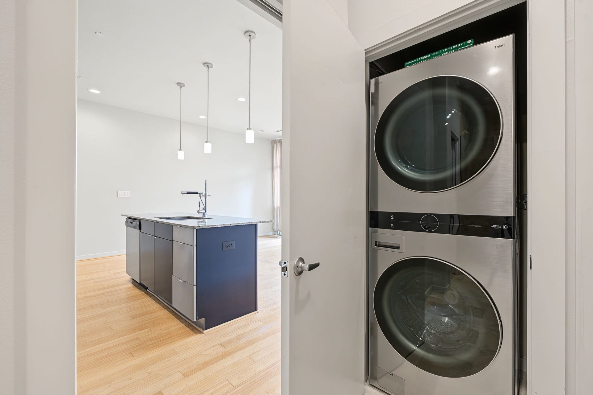 Smart Use of Space! Convenience is built right in with a dedicated laundry closet housing the included stackable washer and dryer! A separate utility closet next to this neatly conceals the home's mechanical components, keeping everything organized and out of sight while maximizing valuable living space.