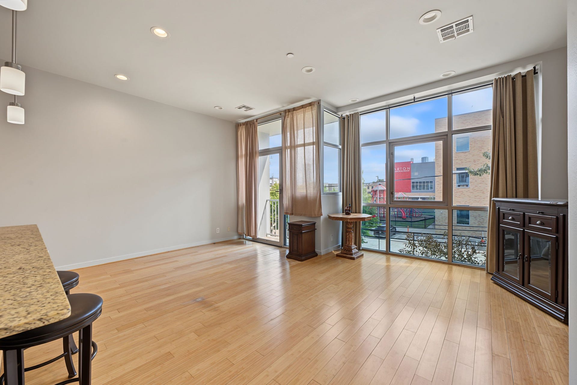 A convenient nook provides the perfect spot for a home office or computer station without sacrificing valuable living space! Step outside onto the adjoining balcony to enjoy a breath of fresh air and take in the surrounding city atmosphere.
