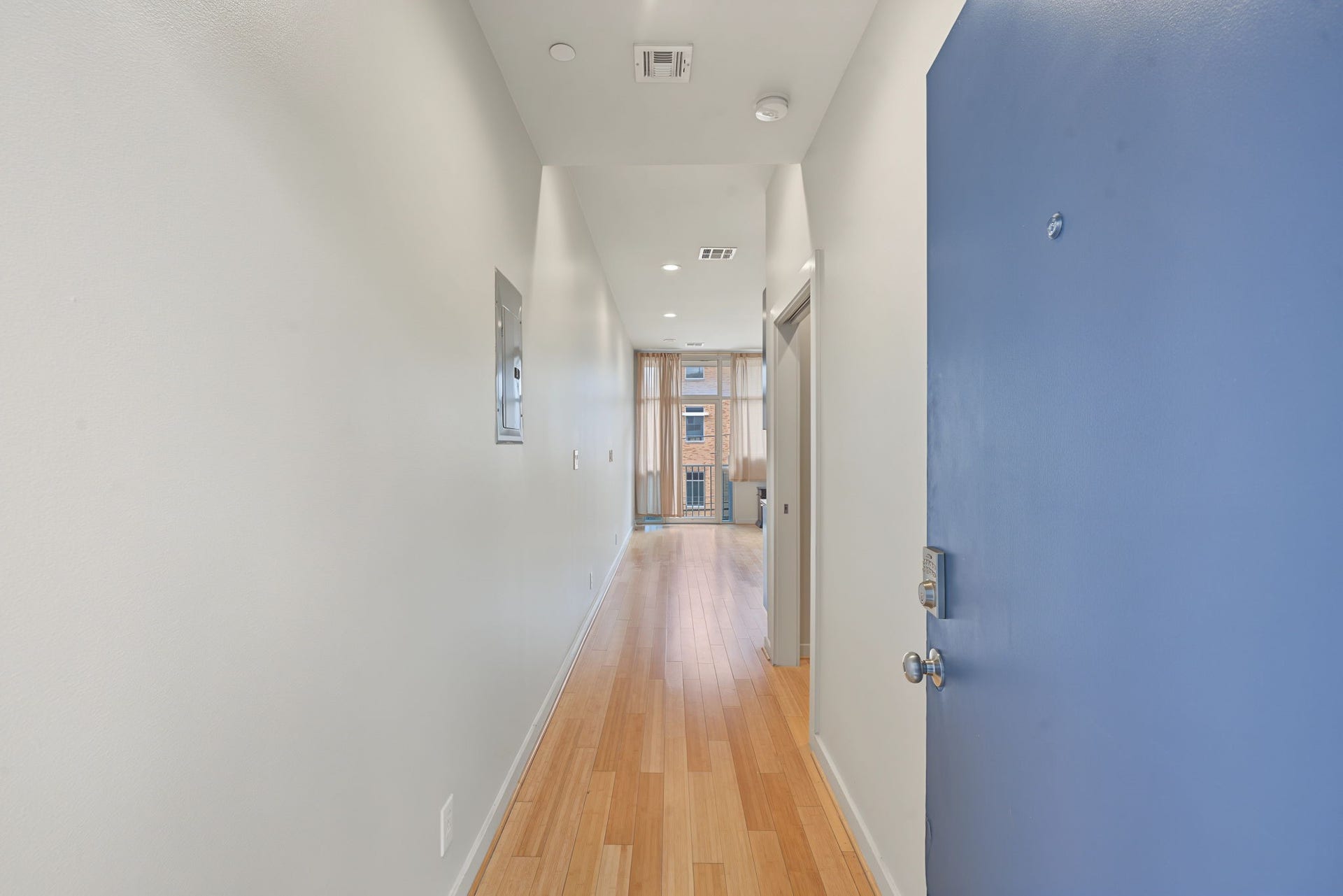 Step inside and experience the sophisticated urban vibe of this contemporary condo! Soaring ceilings, beautiful bamboo wood flooring, and sleek, ultra-modern cabinetry create a stylish, welcoming atmosphere that perfectly complements the excitement of city living.
