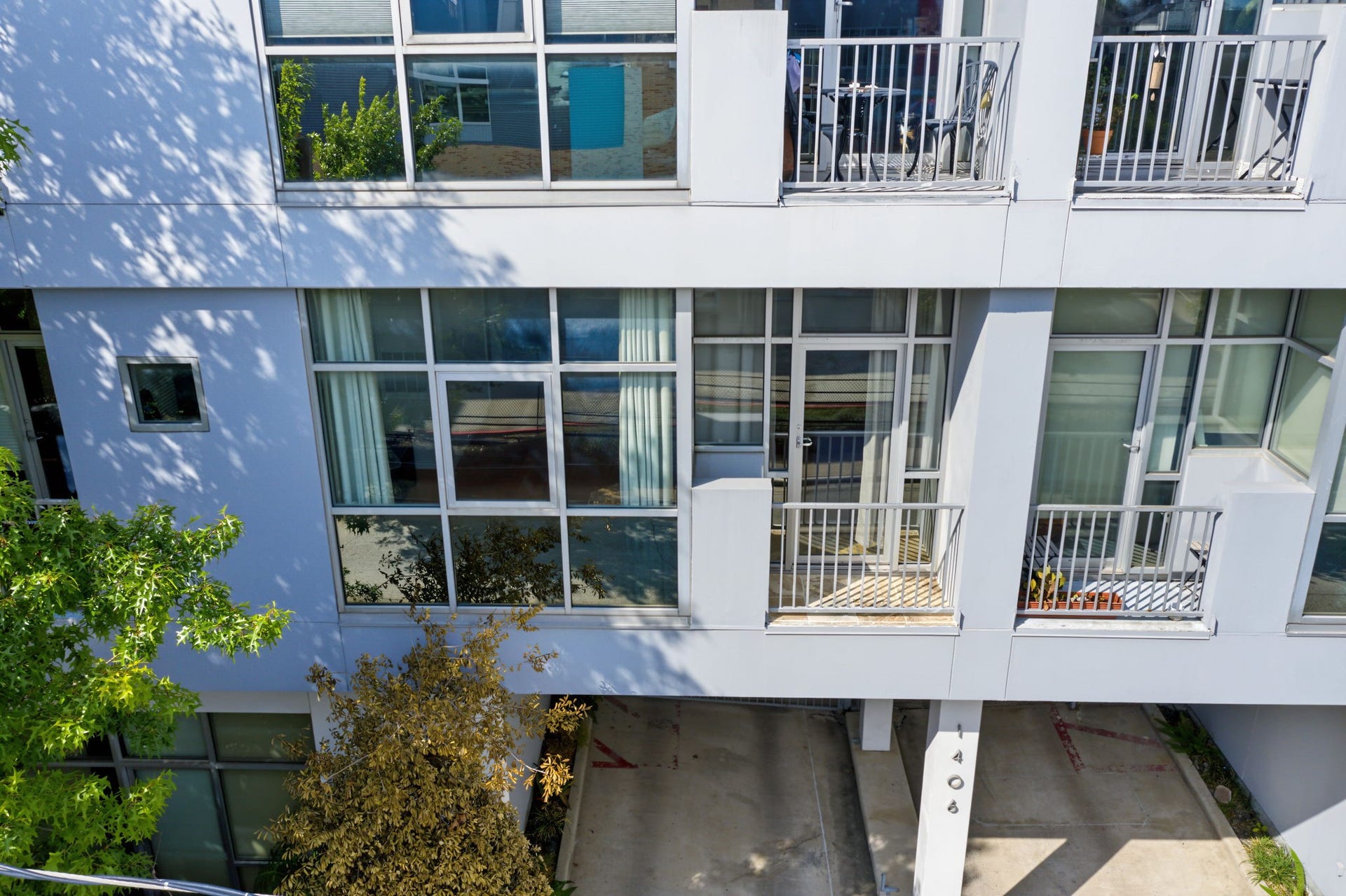 An abundance of windows welcomes natural light into this stylish condo, creating a bright, airy atmosphere throughout the living spaces. Step outside onto your private balcony to enjoy a breath of fresh air, take in the surrounding city views, and soak up the vibrant energy of urban living!
