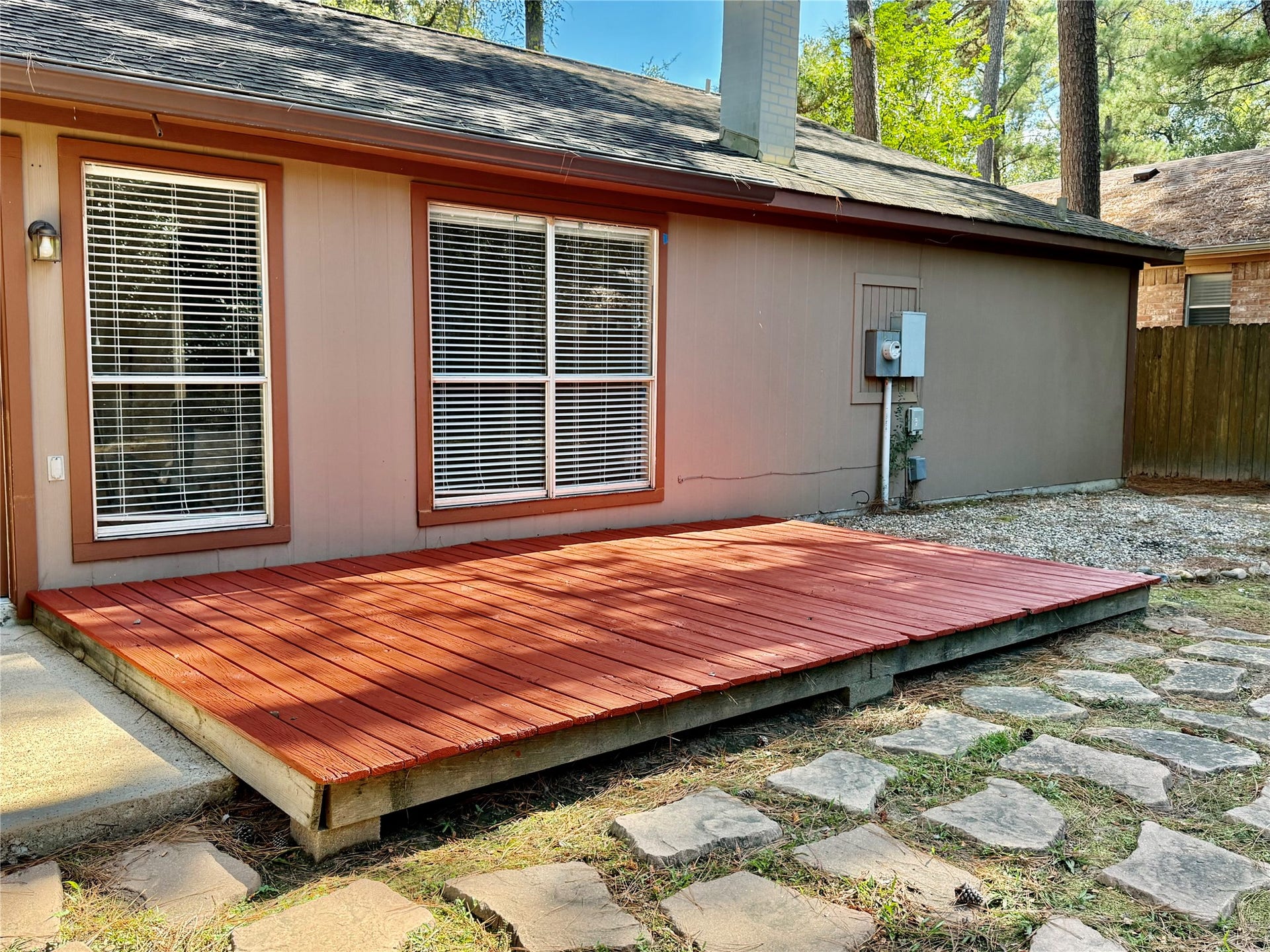 6 Leverwood Court, The Woodlands, TX 77381 Freshly stained backyard deck extends the living space outdoorsideal for relaxing or entertaining.